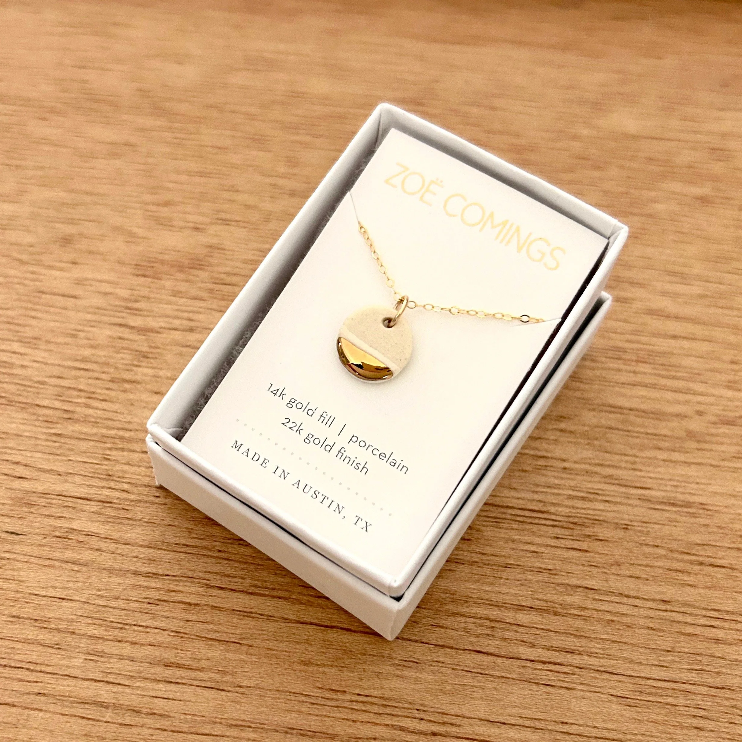 ZOË COMINGS tiny pebble necklace, gold, boxed a.jpg