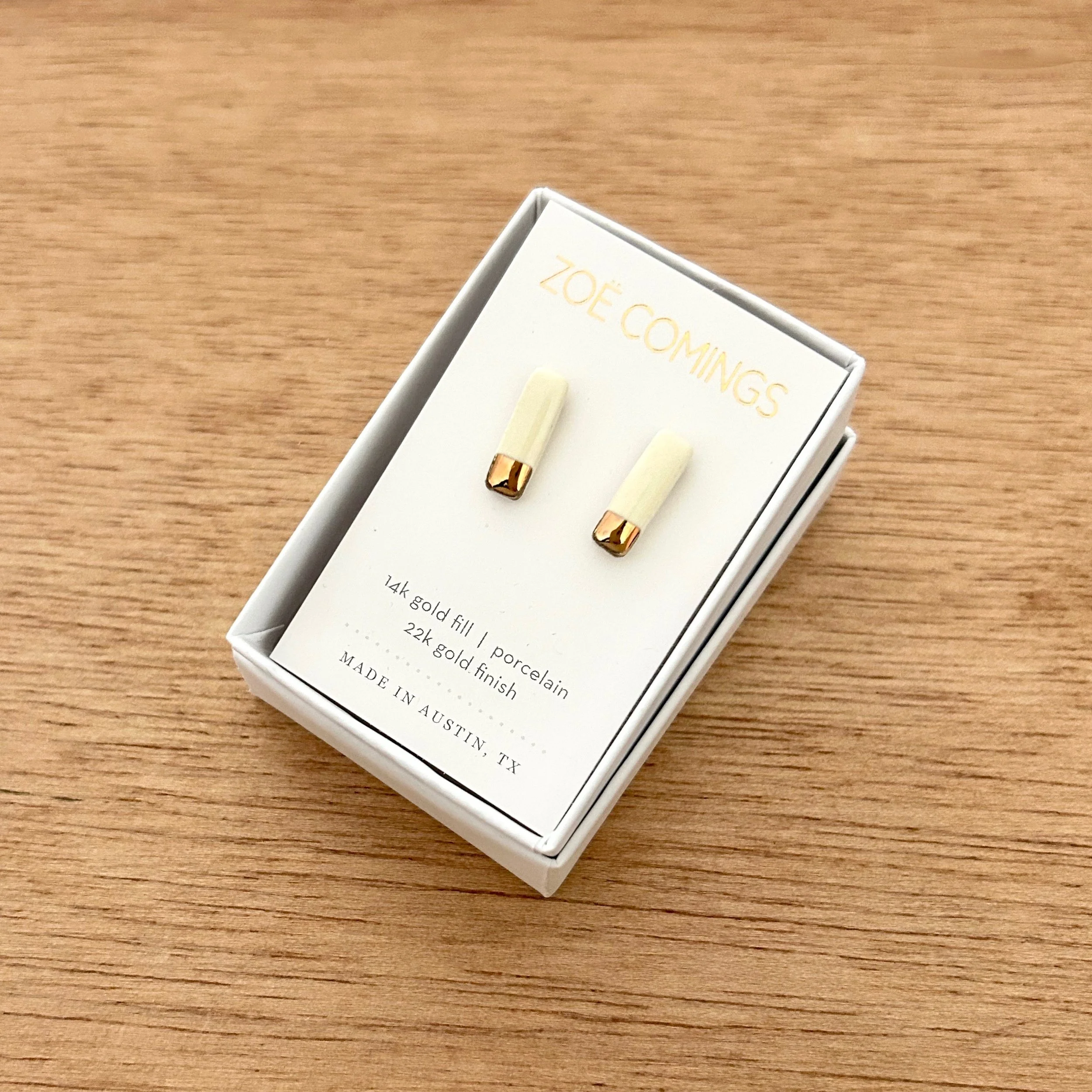 ZOË COMINGS tiny reed studs, white, boxed a.jpg