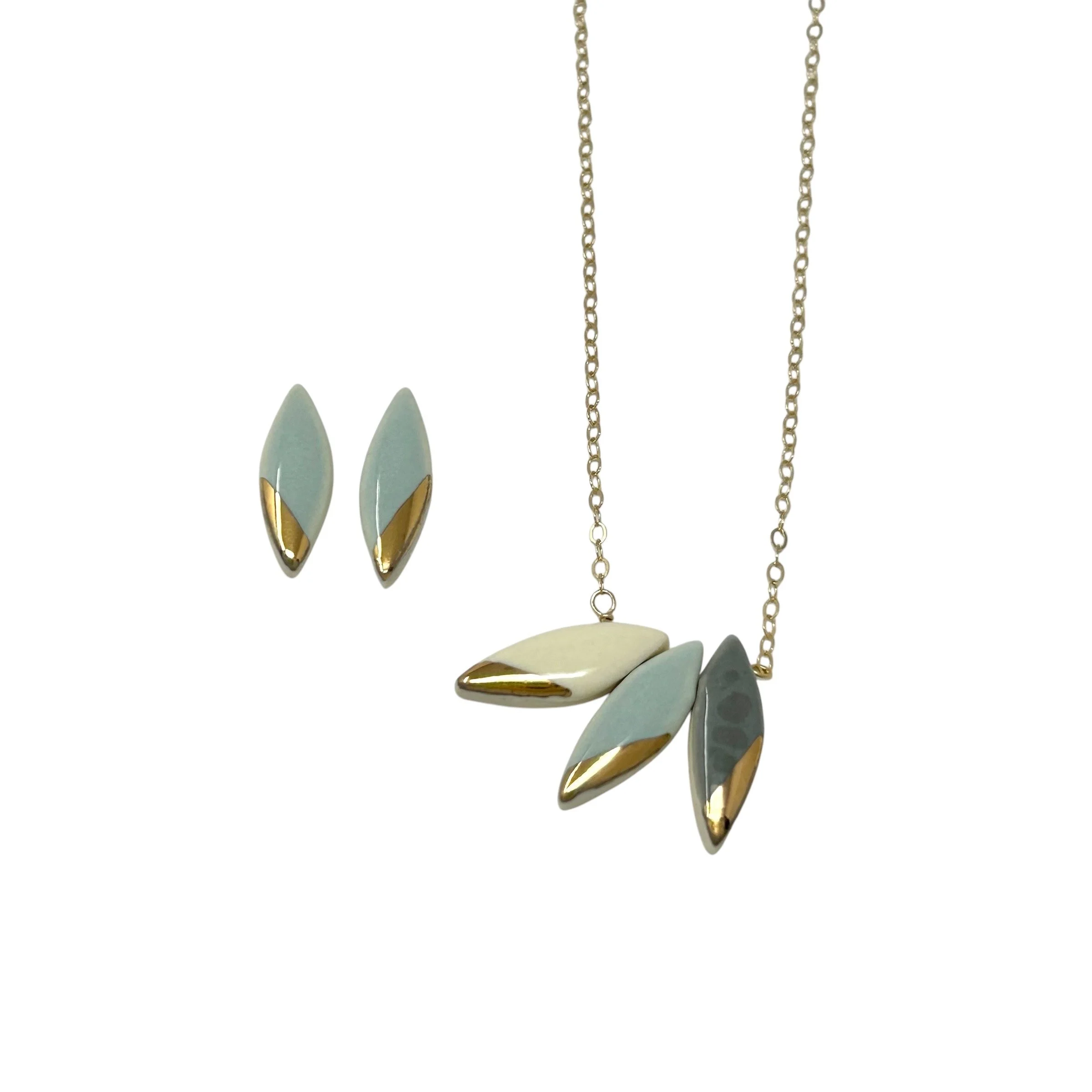ZOË COMINGS triple leaf necklace w:bl:dk + leaf studs bl.jpg