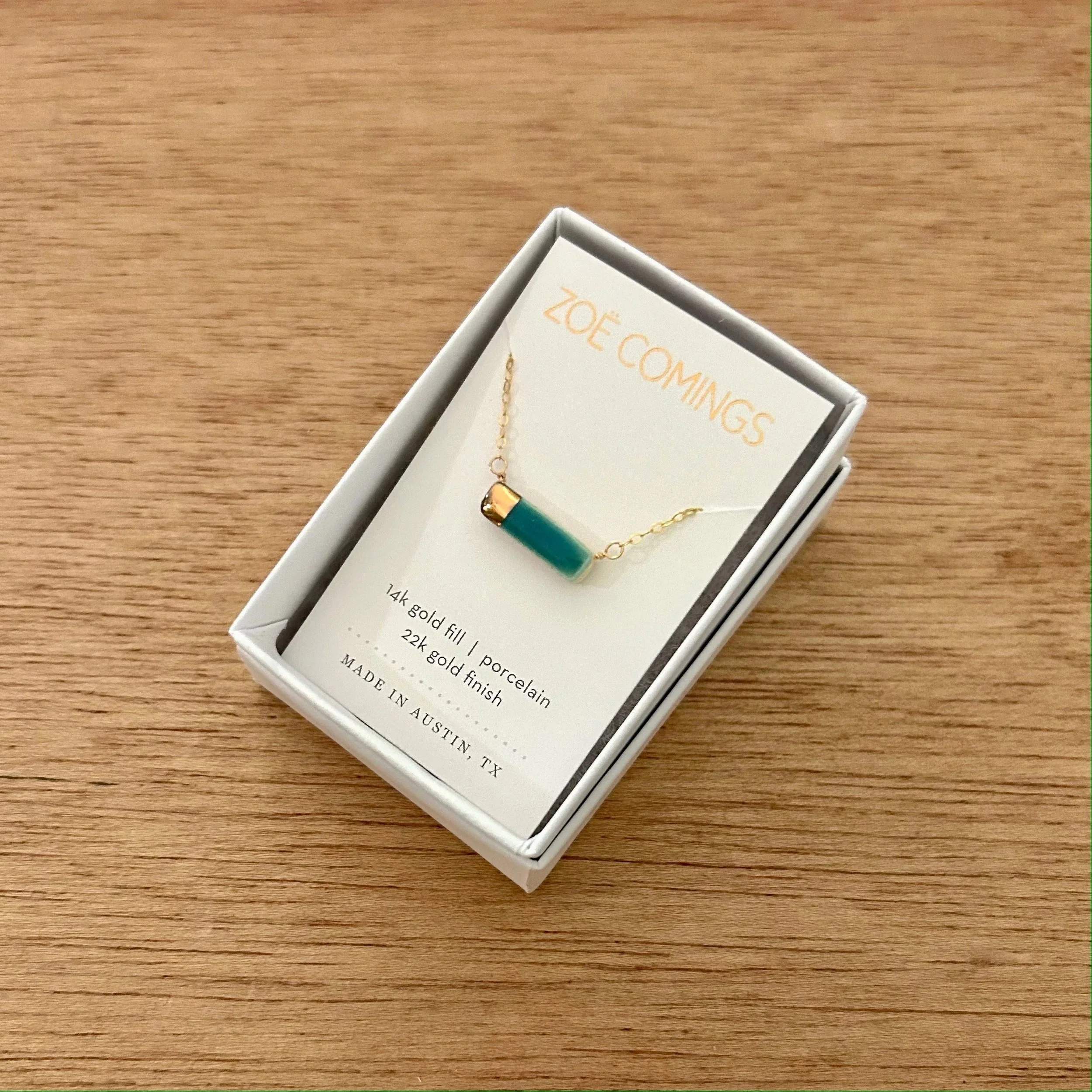 ZOE%CC%88+COMINGS+teeny+reed+necklace%2C+teal+boxed+a.jpg