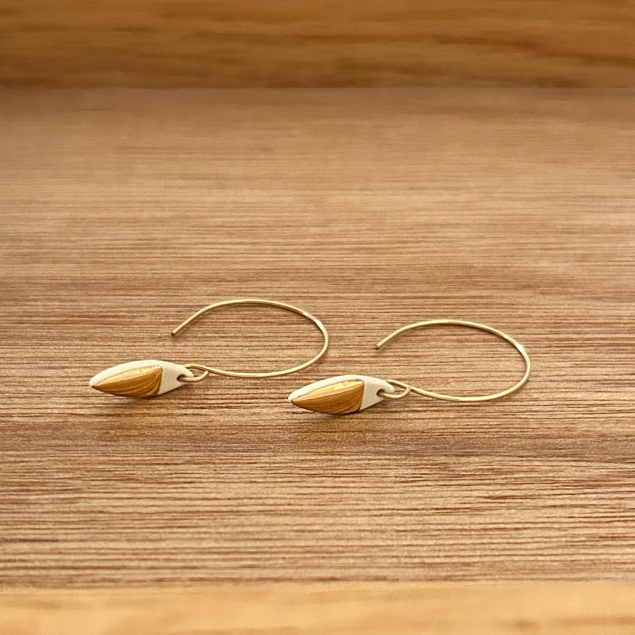 ZOË COMINGS tiny leaf hoops, gold, wdbkg a.jpg