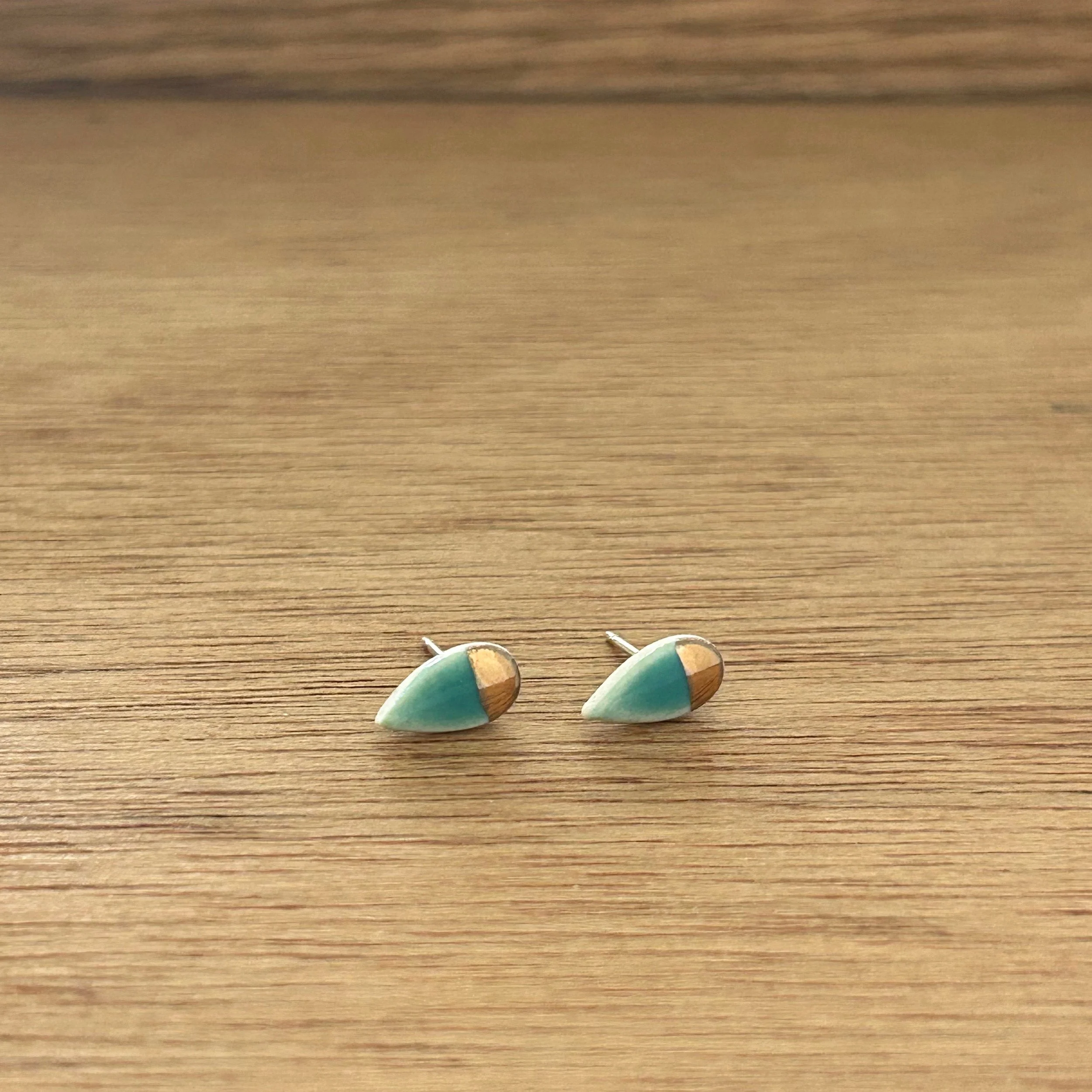 ZOË COMINGS tiny petal studs, teal:gold half, a wdbkg.jpg