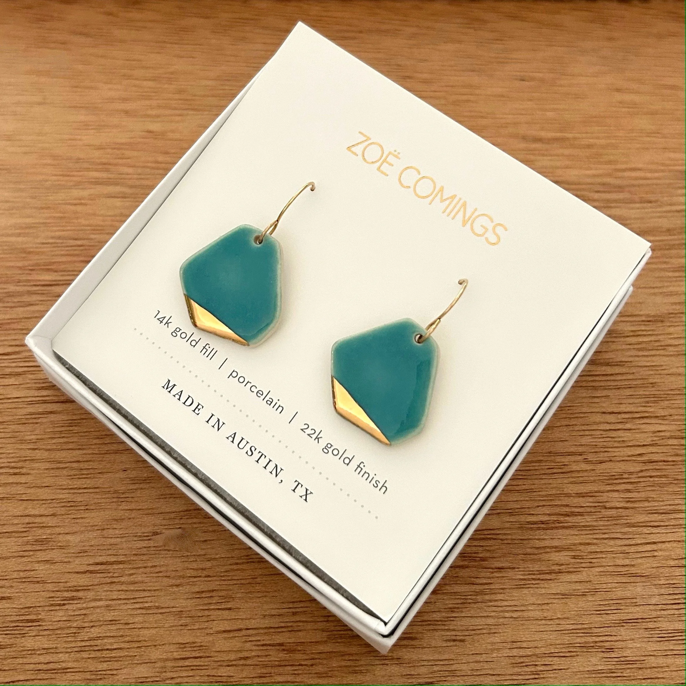 ZOË COMINGS large geo earrings, teal:gold, boxed a.jpg