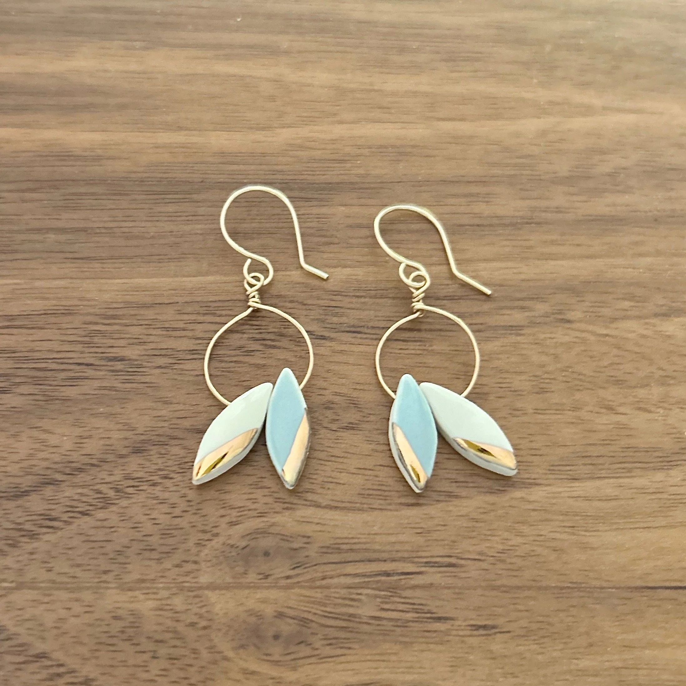 ZOË COMINGS double leaf earrings, white:pale blue wdbkg.jpg