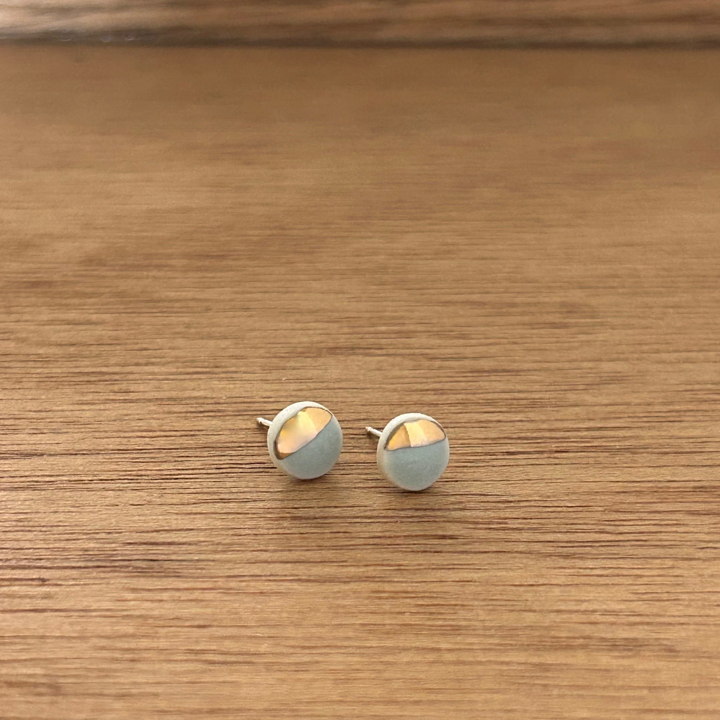 ZOË COMINGS tiny pebble studs, pale blue:gold half, a wdbkg.jpg
