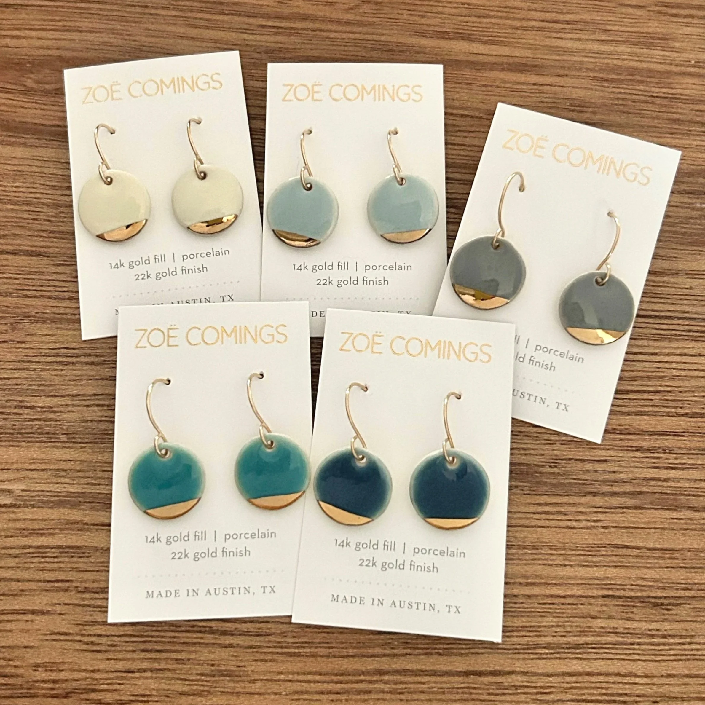 ZOE%CC%88+COMINGS++pebble+earrings+gold+slice%2C+cluster+carded+wbkgd.jpg