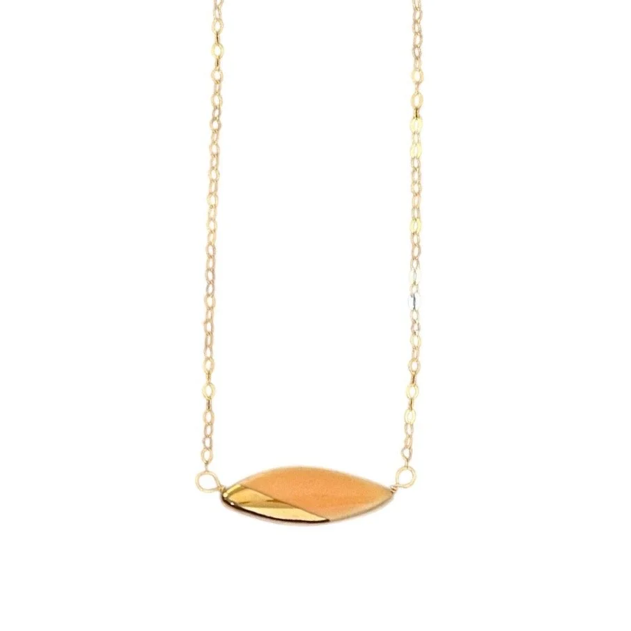 ZOË COMINGS teeny leaf necklace, bright orange:gold angle, wbg.jpg