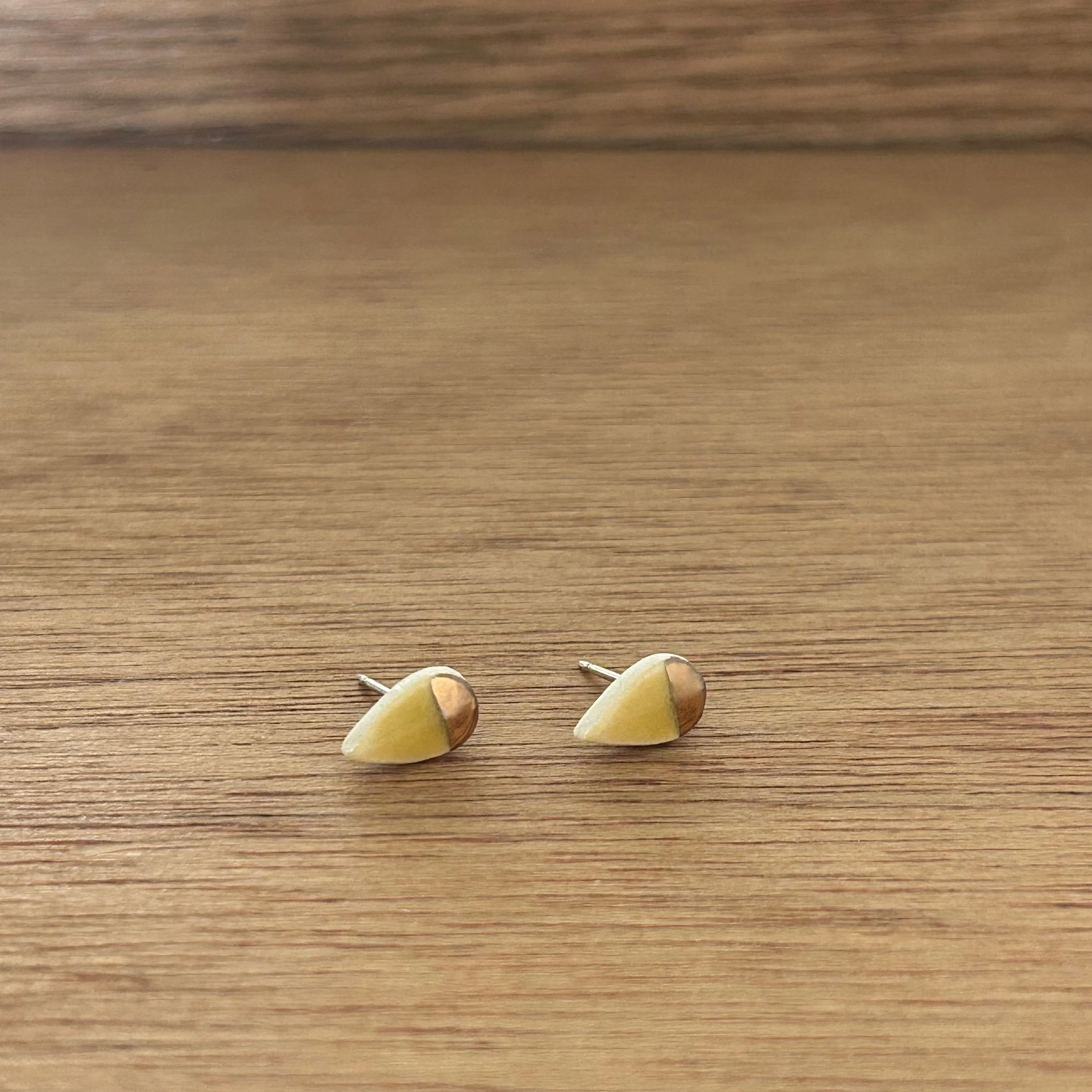 ZOË COMINGS tiny petal studs, marigold:gold half, a wdbkg.jpg