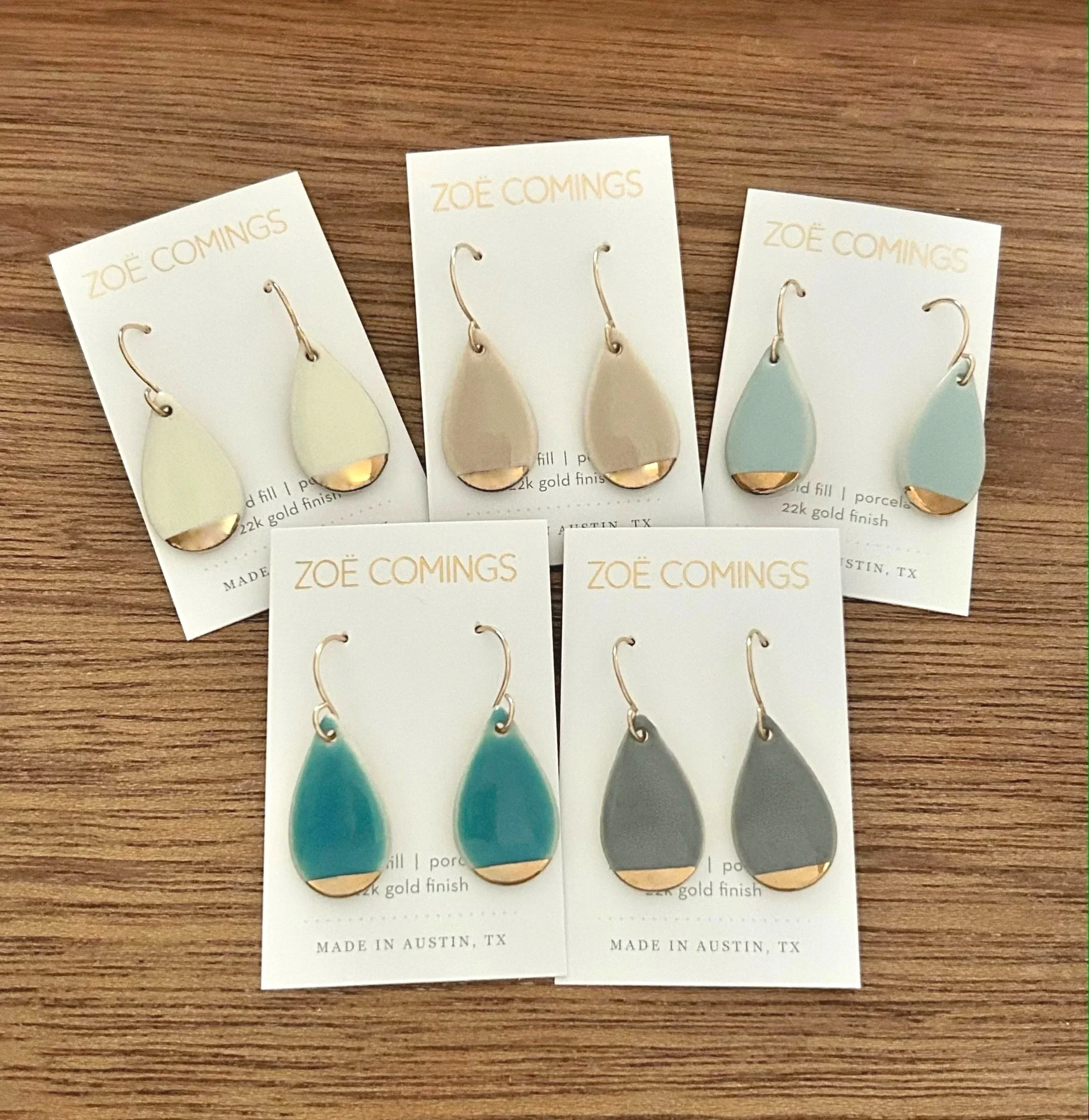ZOE%25CC%2588%2BCOMINGS%2B%2Bteardrop%2Bearrings%2Bgold%2Bslice%252C%2Bcluster%2Bcarded%2Bwbkgd.jpg
