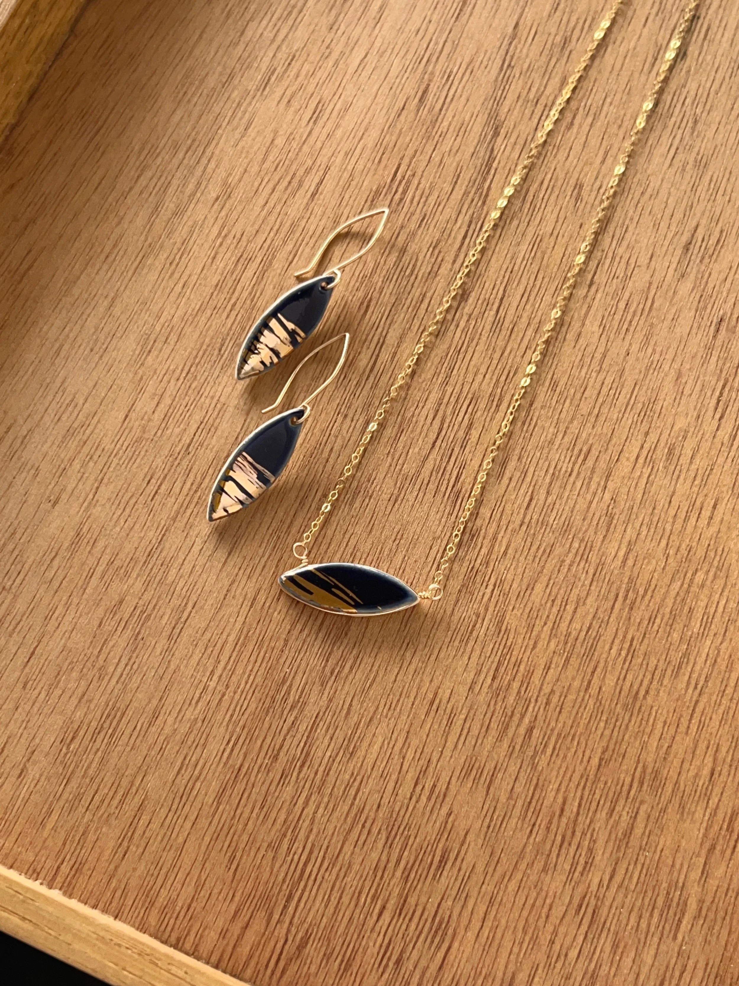 ZOË COMINGS leaf ers + nk, shimmer navy wdbkg a.jpg