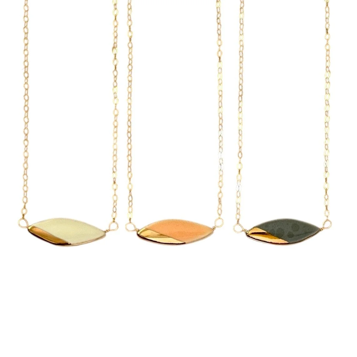ZOË COMINGS teeny leaf necklace w:or:dk wbg.jpg