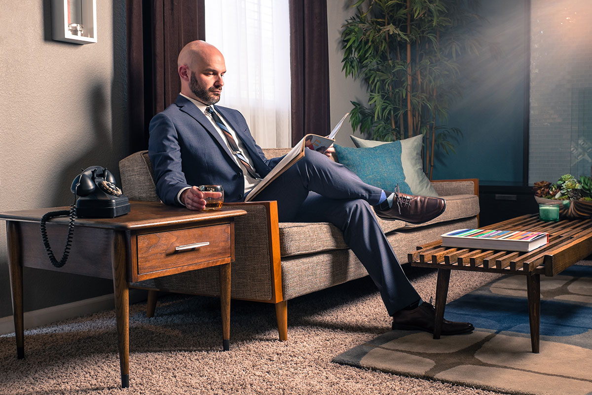 Robert relaxing with a 21 year single malt, neat. Photo courtesy of Pacheco Photography .