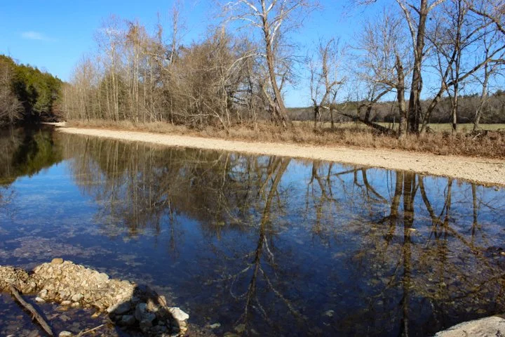 ACREAGE WITH LARGE HAYFIELD AND WATER  $540,000