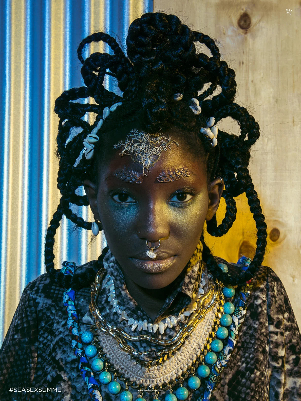 Snakeskin tunic THULA SINDI Beaded neckpiece with blue balls HENRIETTE BOTHA Silver and gold snake necklaces CHINA CITY Freshwater pearls CHINA CITY