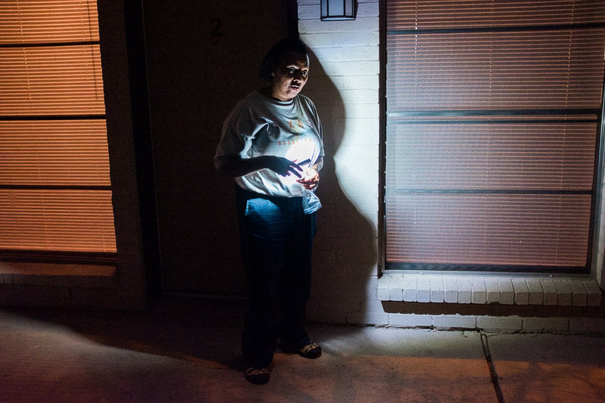 Woman with flashlight