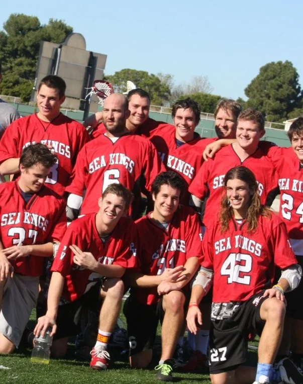 Coach Jaffe, #6, and center, victorious, with his team....