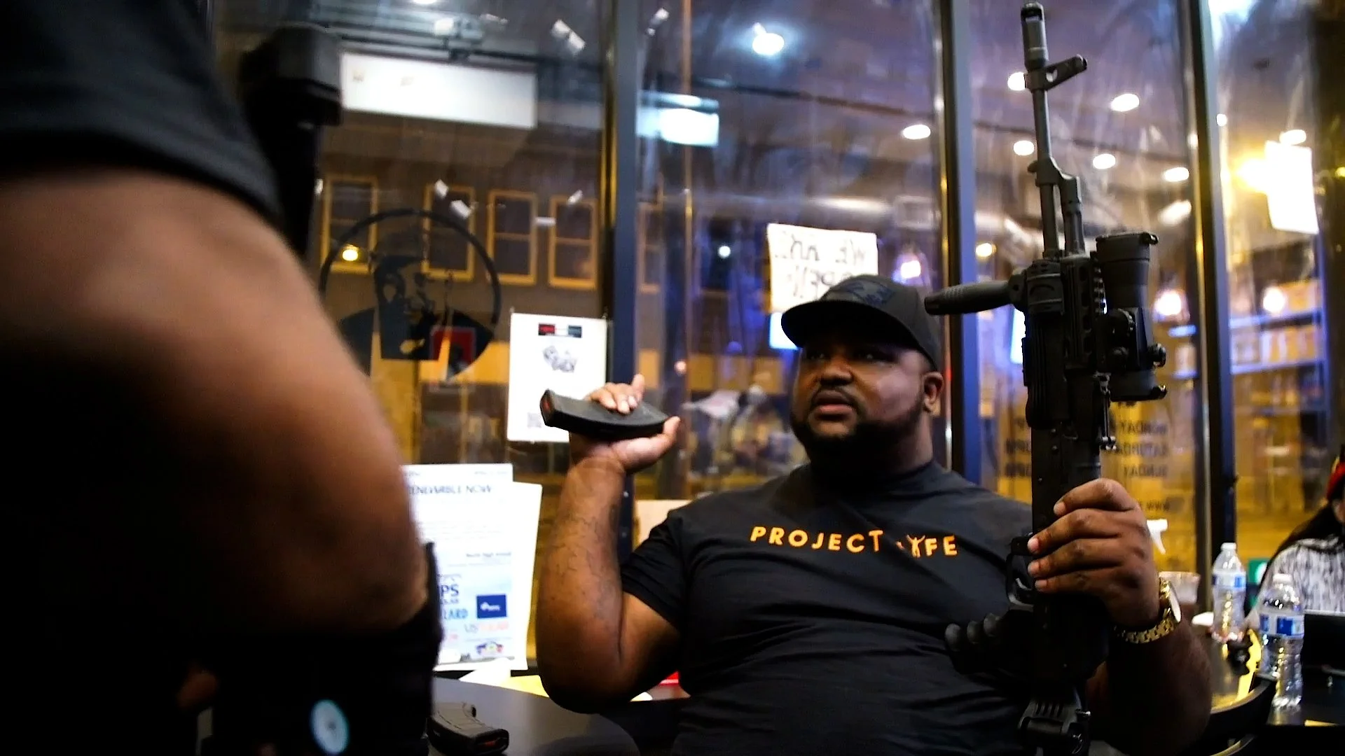 After nights of violence in Minneapolis, locals take up arms to defend their community