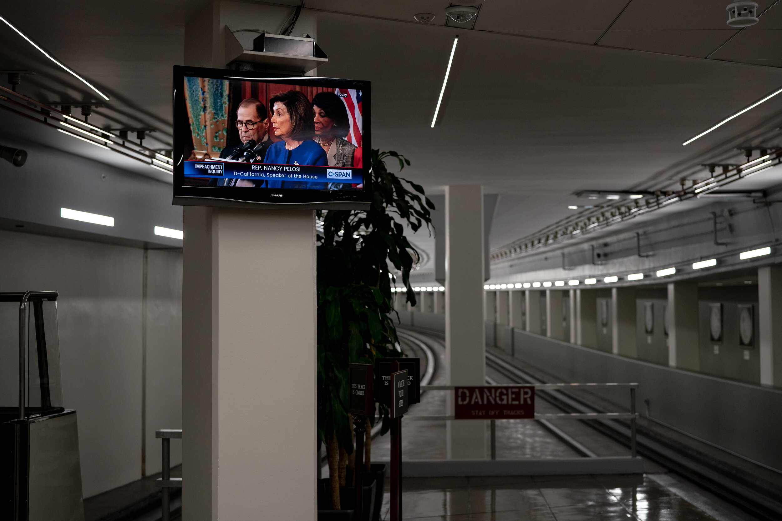  A TV screen in the Capitol subway shows House Speaker Nancy Pelosi (D-CA) speaking at a press conference where she announced the articles of impeachment on Capitol Hill in Washington, DC on December 10, 2019. (Erin Schaff/The New York Times)
NYTCRED