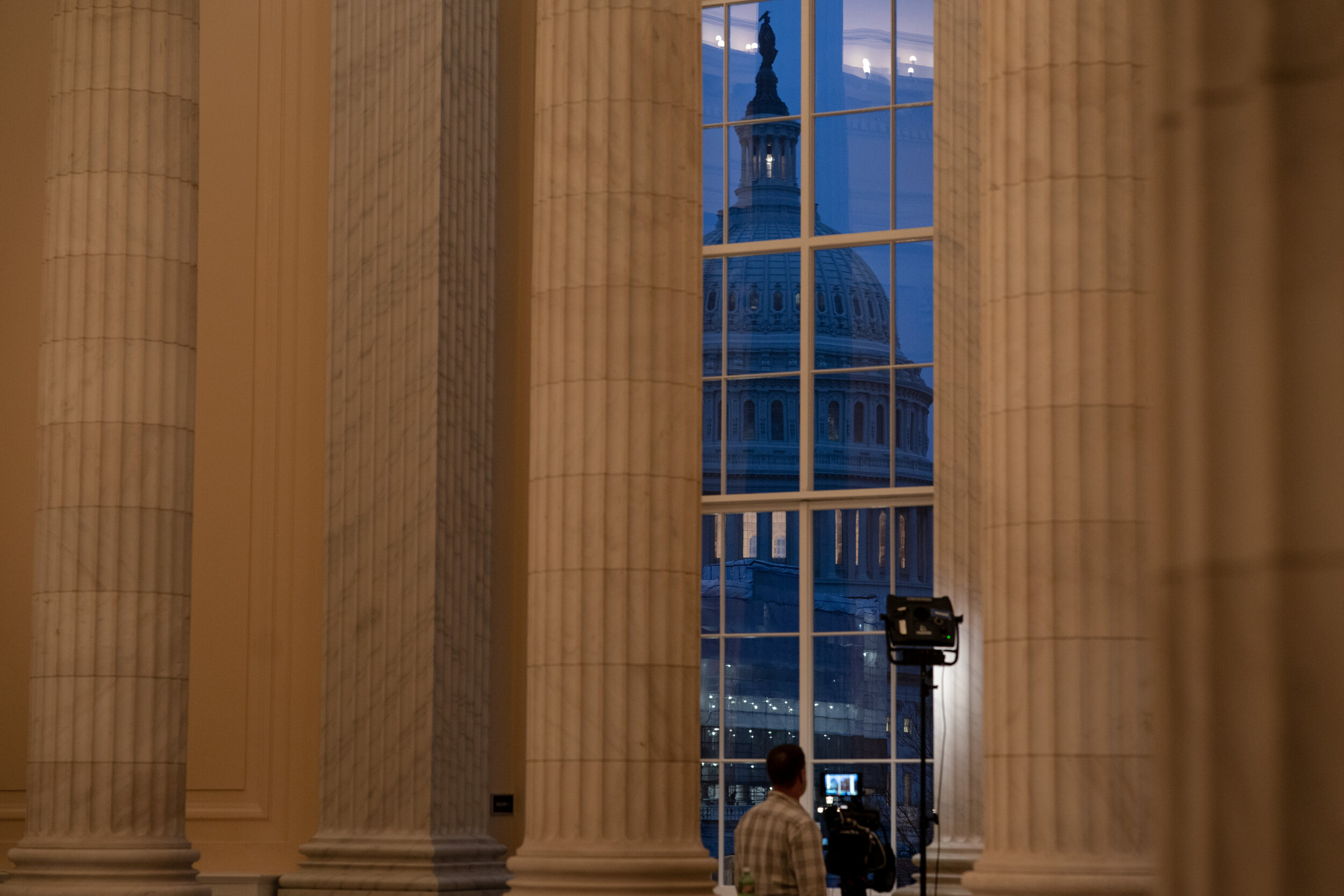  NYTIMPEACH The capitol dome is seen from a house office building where a tv crew is setting-up during the House Judiciary Committee hearing on impeachment is taking place on Capitol Hill in Washington, DC on December 9, 2019. (Erin Schaff/The New Yo