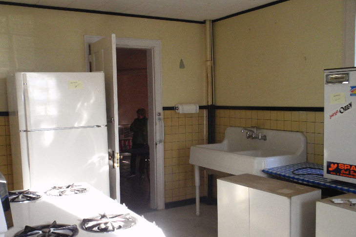  One of the rooms on the first floor of the ell was updated to a modern kitchen. 