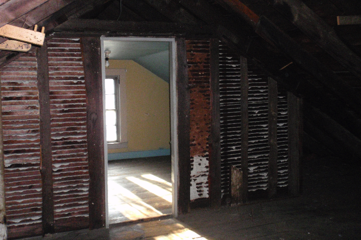  A small room at the front of the attic has been finished; this was likely living space for a servant. 