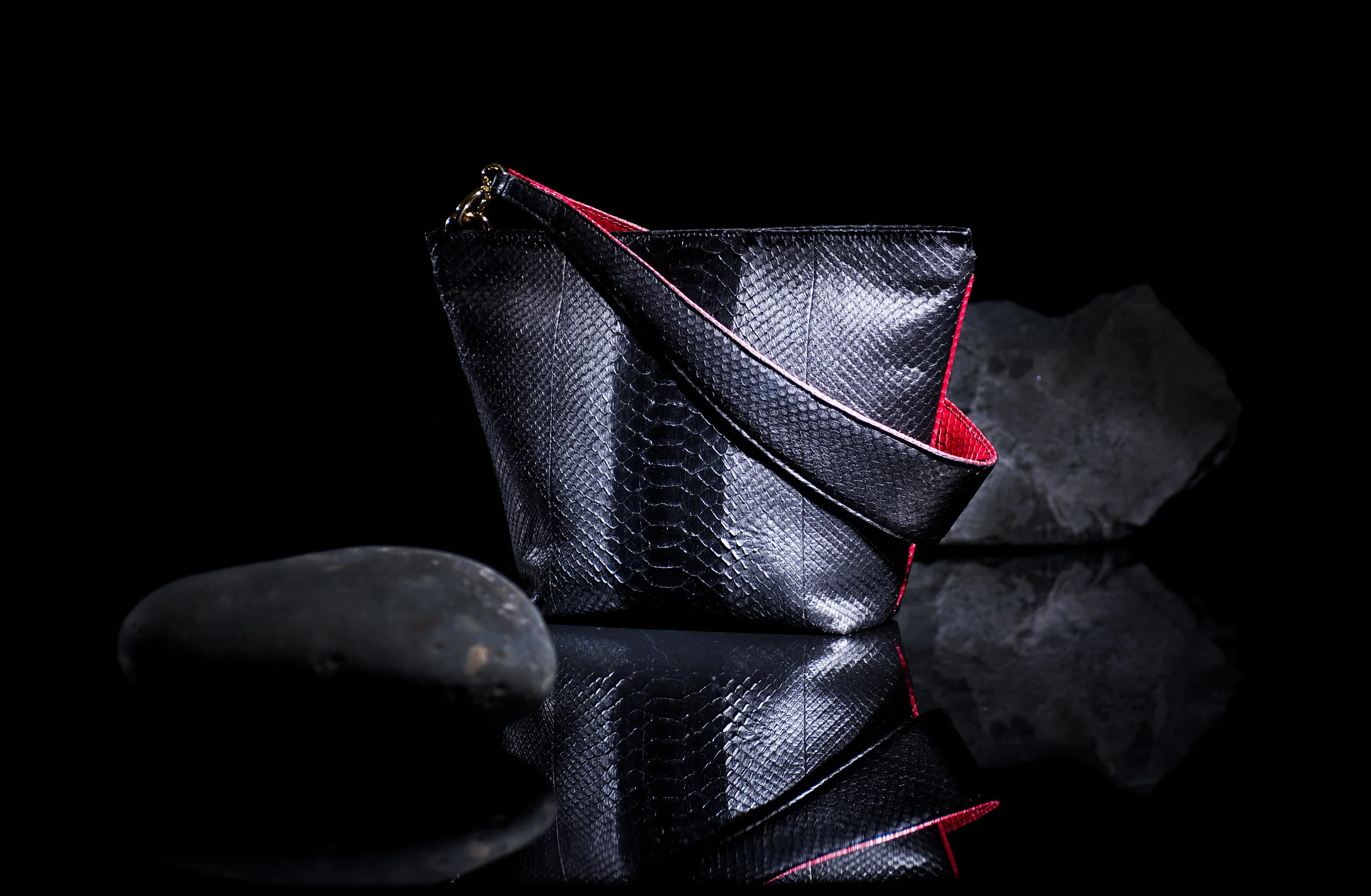 TriangleClutch-Python-BlackEmbossed-HighRes-CLEAN.jpg