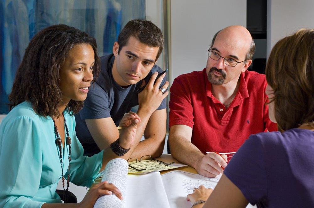Damaris Hollingsworth (left) working with team members at RSP Architects in Minneapolis. 
