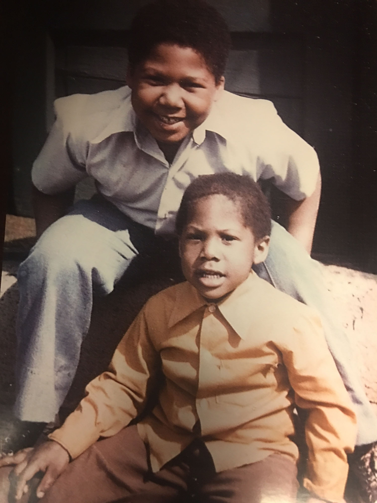 Michael, bottom, with his brother.