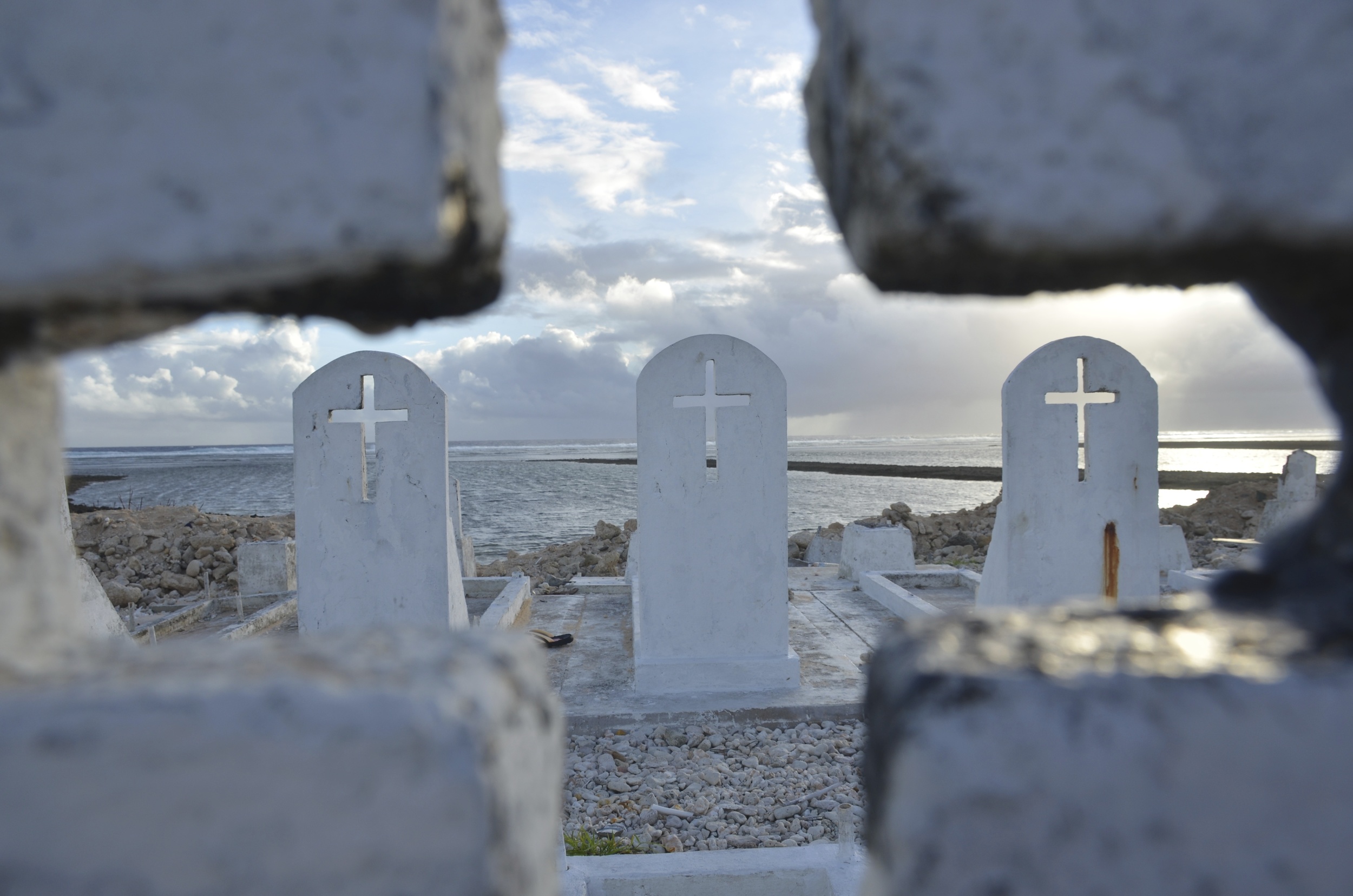  Tides strengthened by sea-level rise are clawing away homes and cemeteries. 