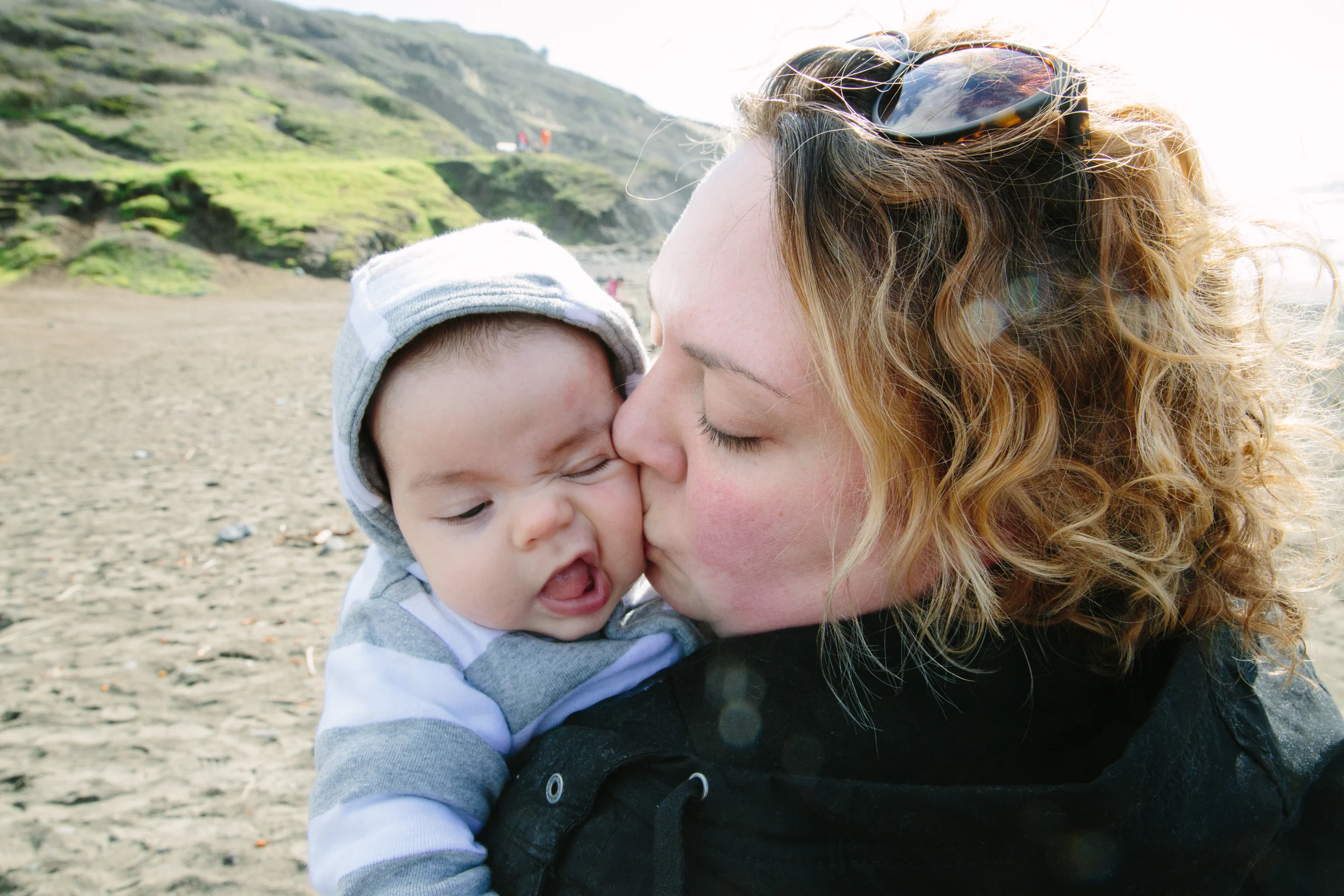 Edie's first trip to the beach. She's marginally more excited about my kisses as she gets older...
