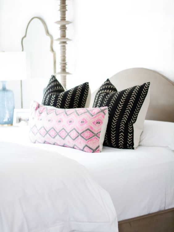 This bedroom, found on Apartment Therapy, incorporates a hint of spring color while keeping with the boho look. 