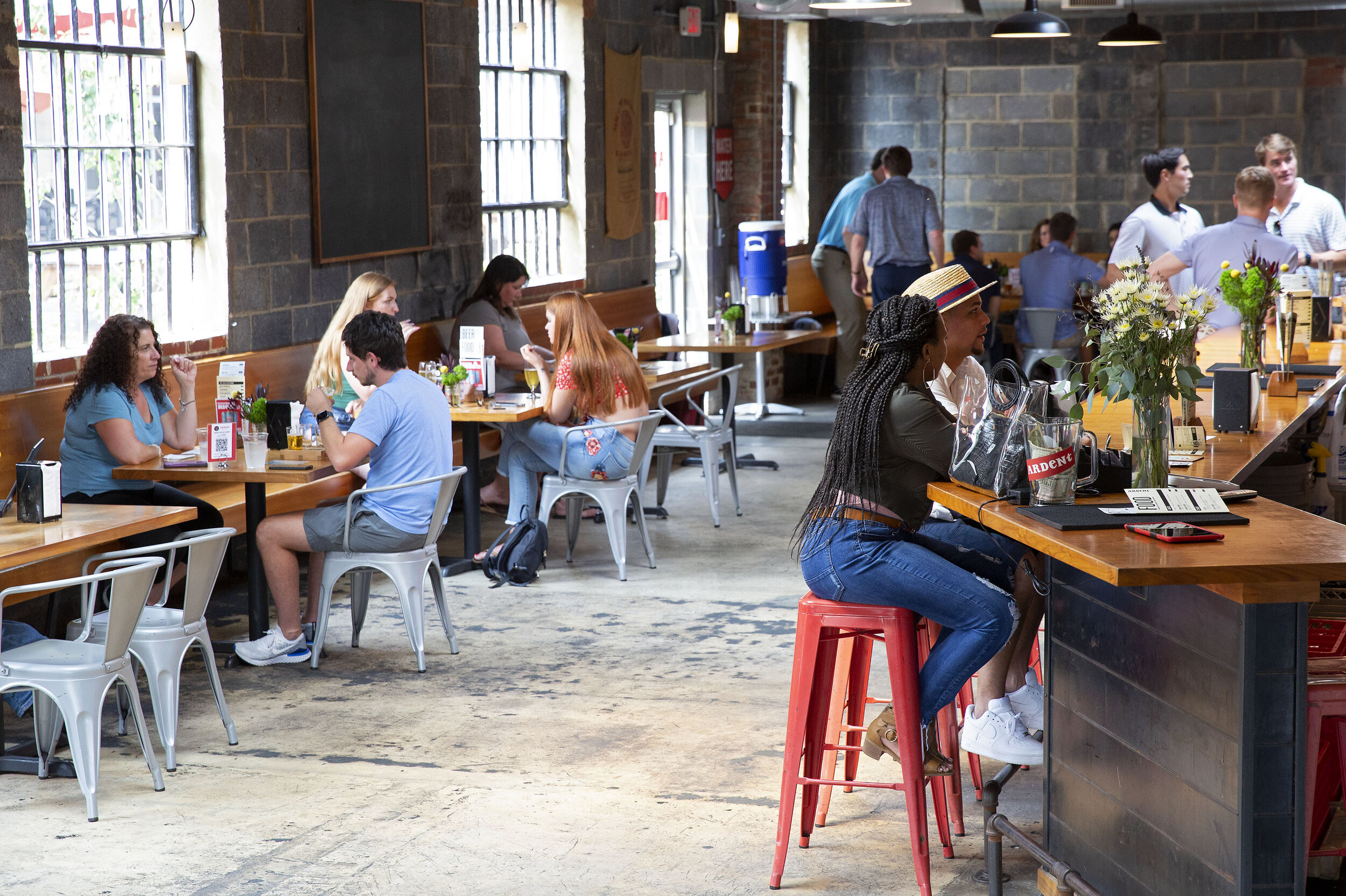 inside taproom people at bar.jpg