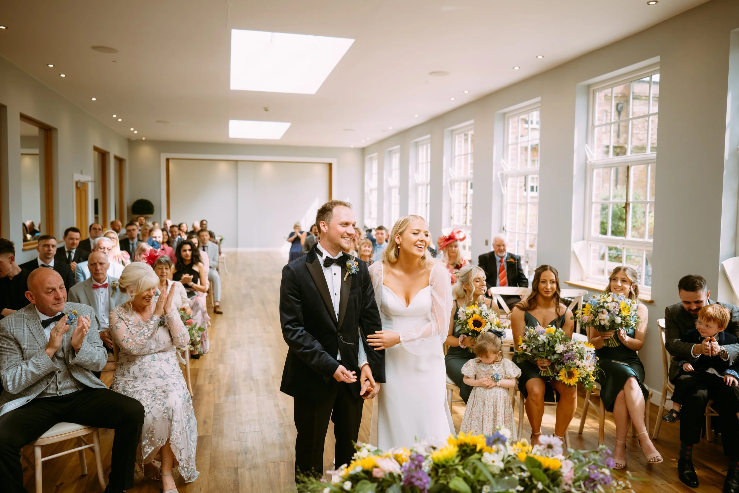 Bride and groom getting married at Bredenbury Court