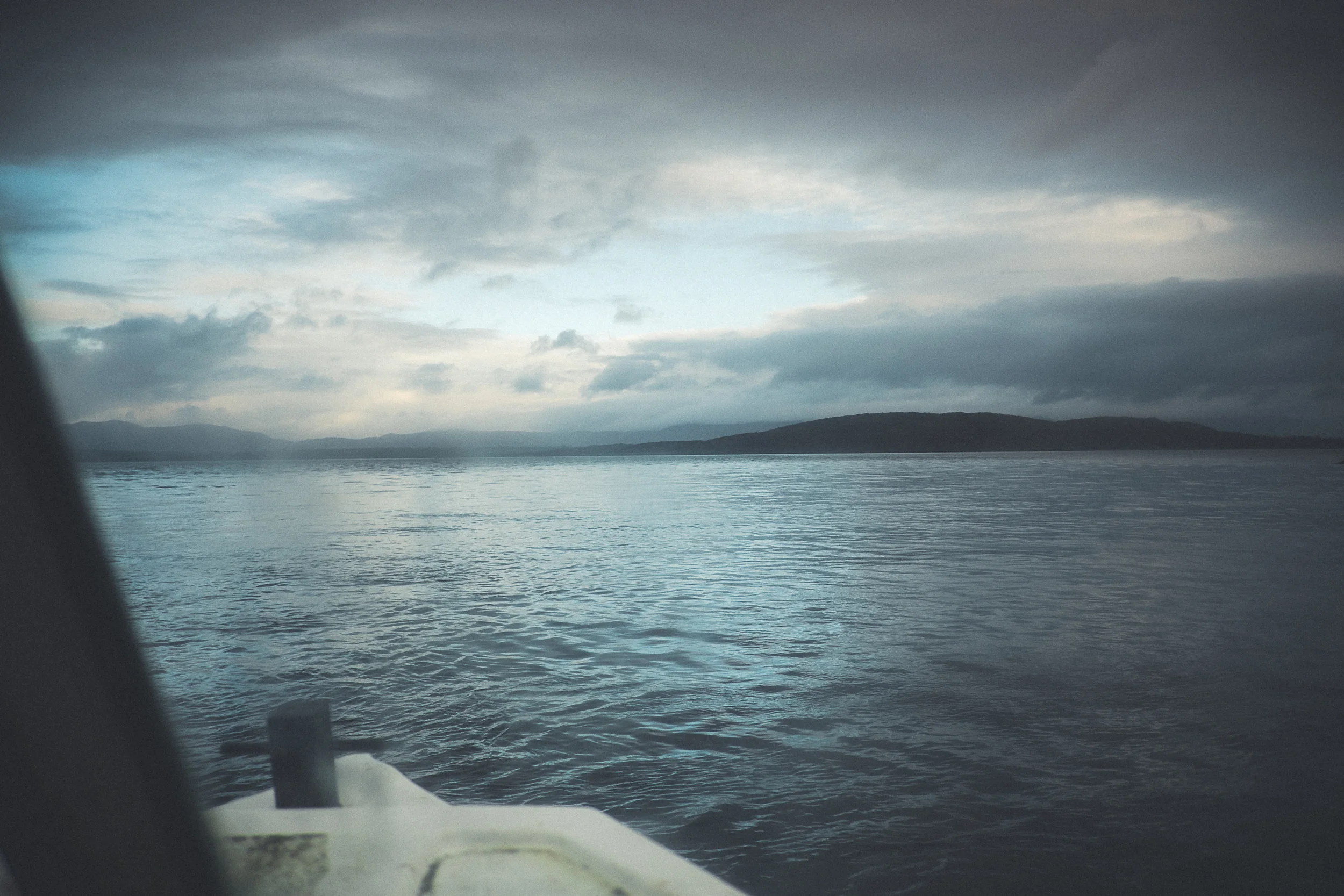 The challenge, photograph a prawn fisherman in a small boat on seas that got much rougher than the photo suggests. Yes. Fuji X-E2 \ 18mm