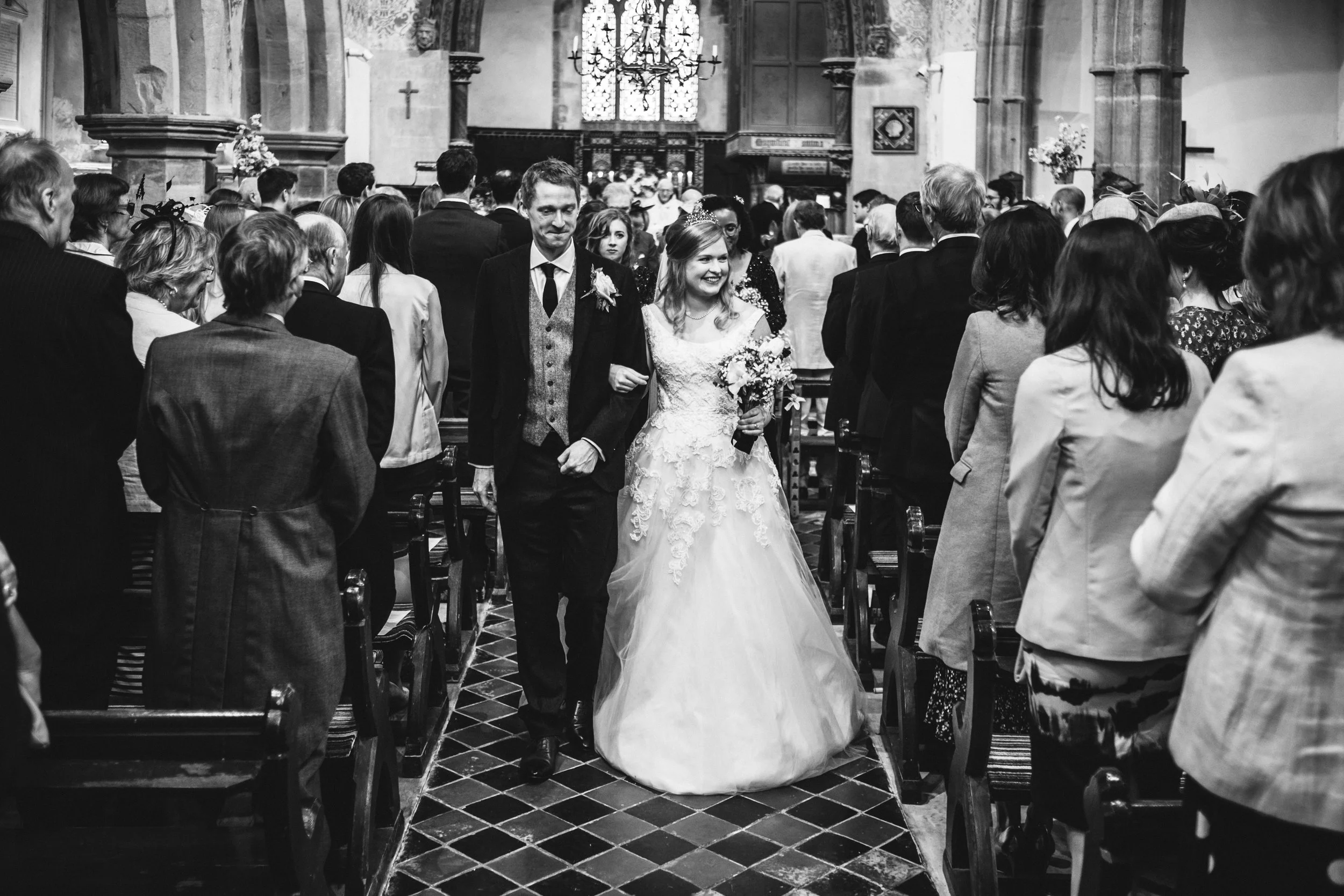 Post wedding walk back down the aisle as a married couple. - Fuji XH-1 + 23mm 1.4 lens