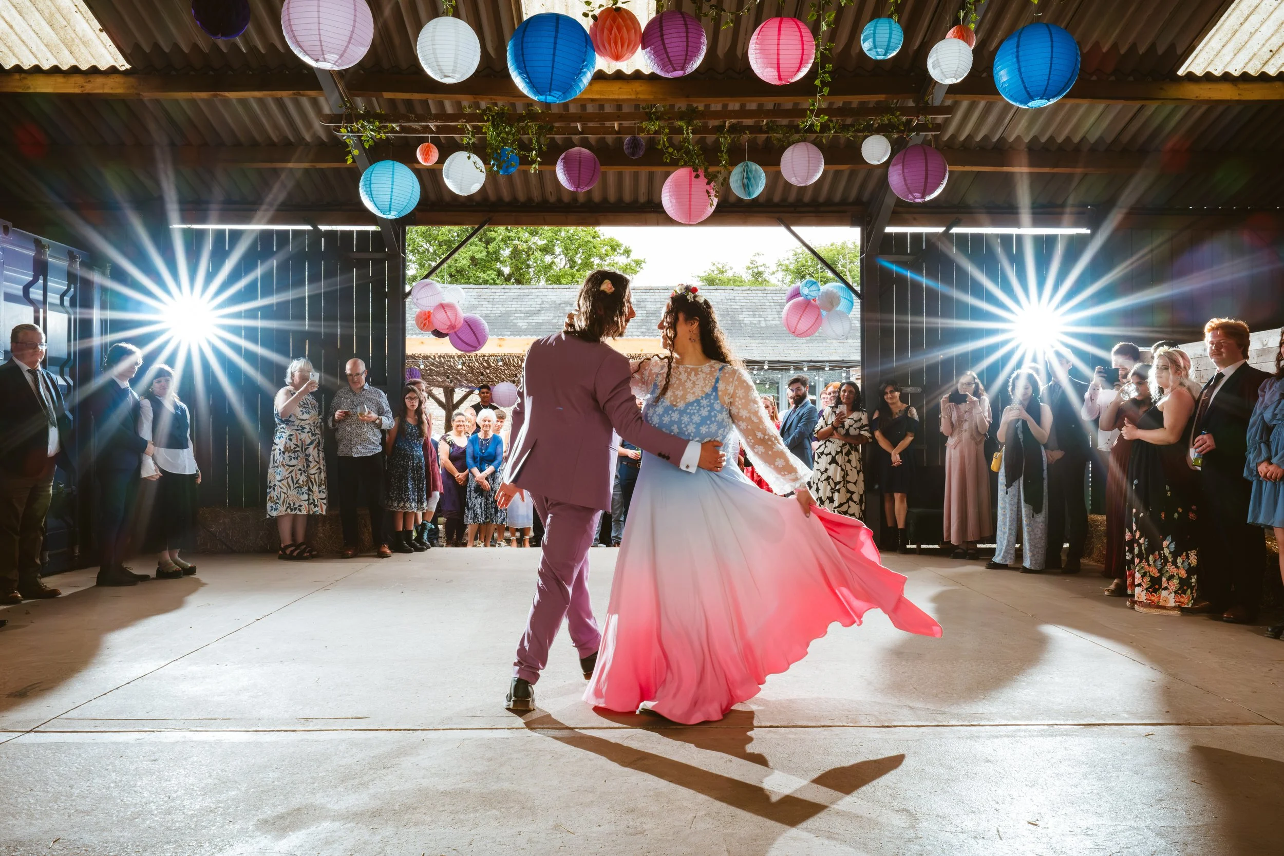 Couple dancing together surrounded by their wedding guests at Drover's Rest