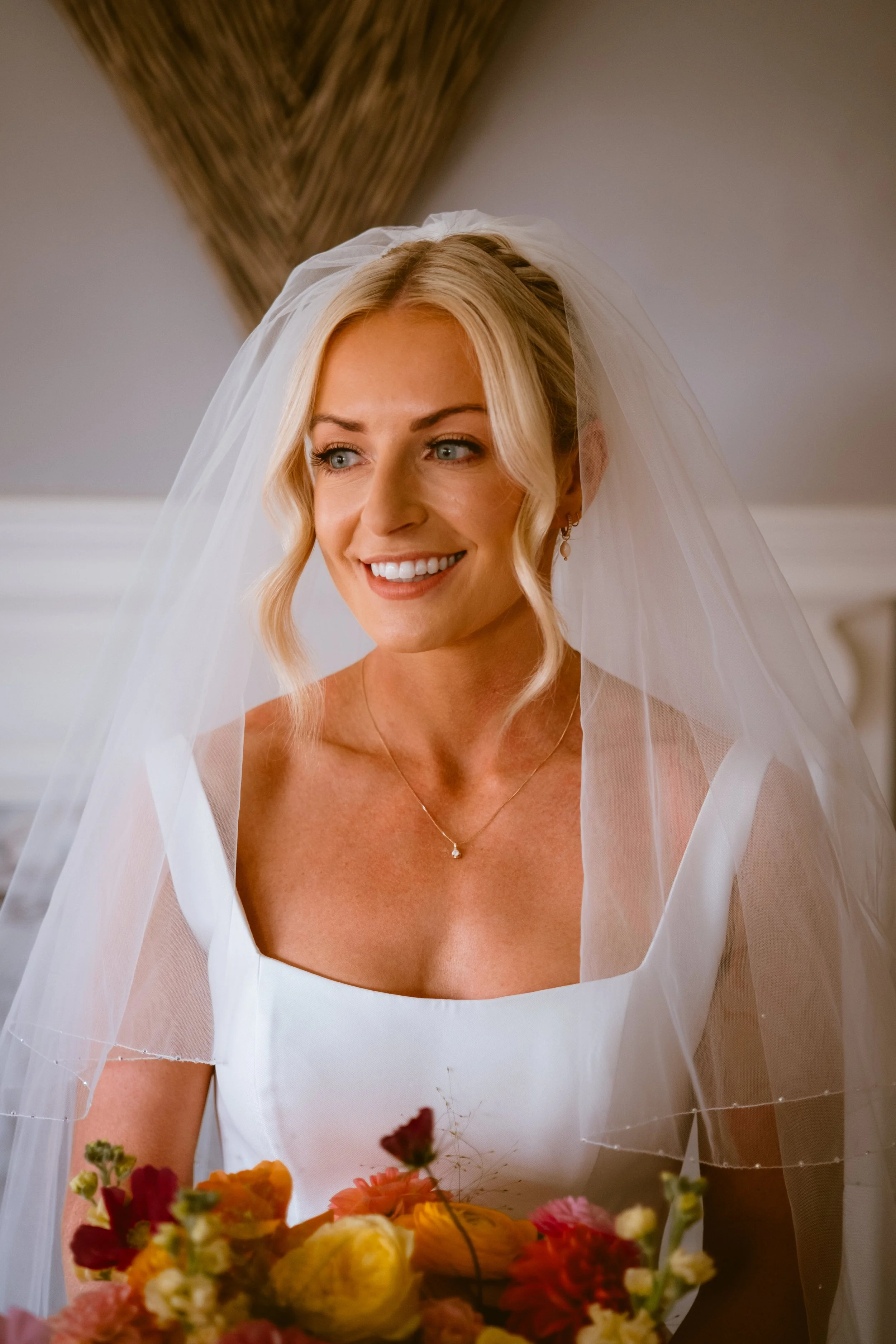 Bridal portrait while holding flowers