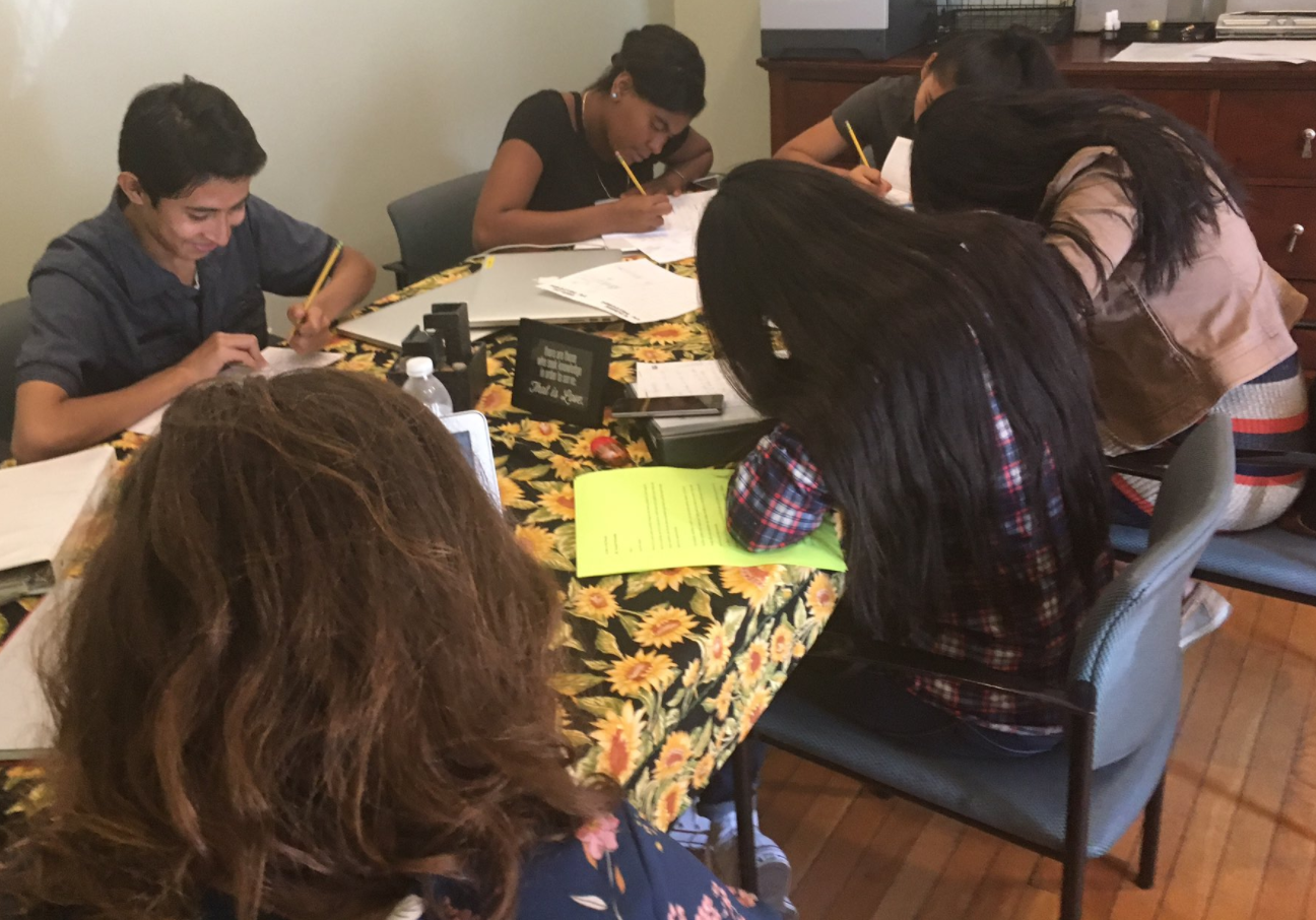  On day 3 of LAYC graphic novel workshop, writers started working on their storyline. Pc: Liz Laribee.&nbsp; 