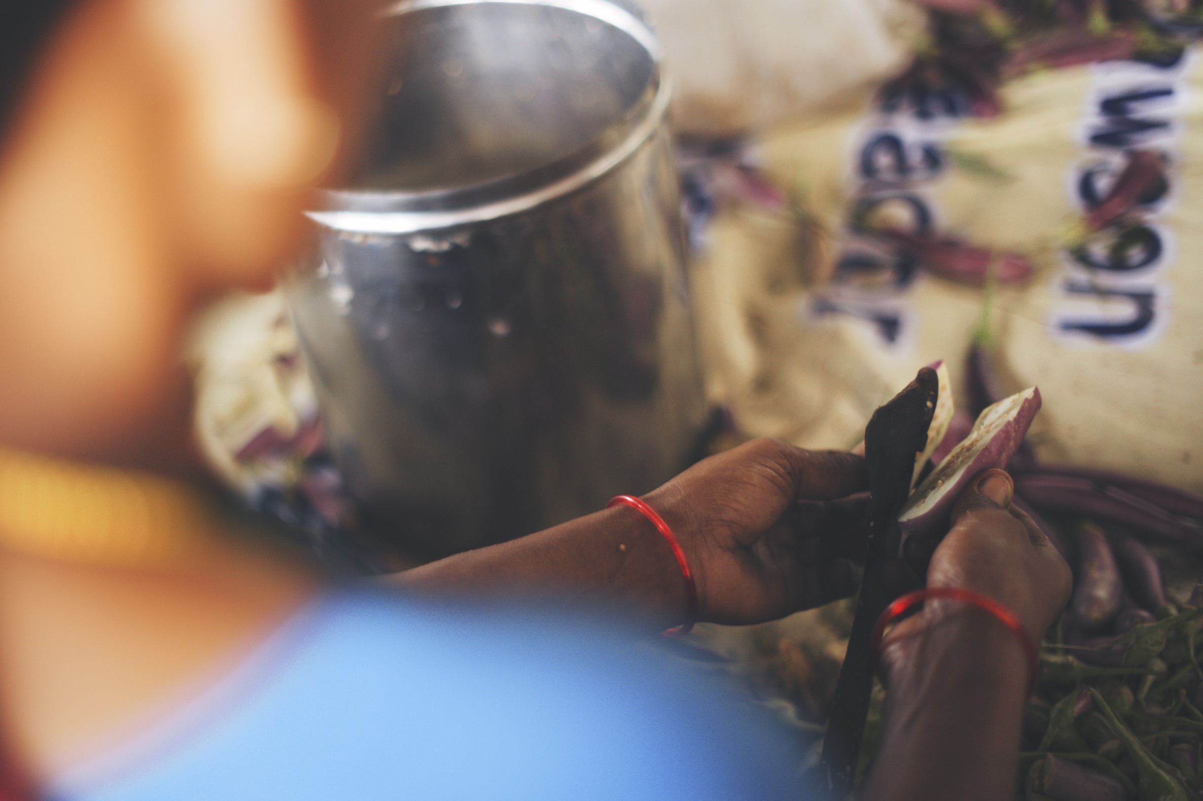 Krupa women helping prepare the meal for Veda School and the kiddos from the slums. 