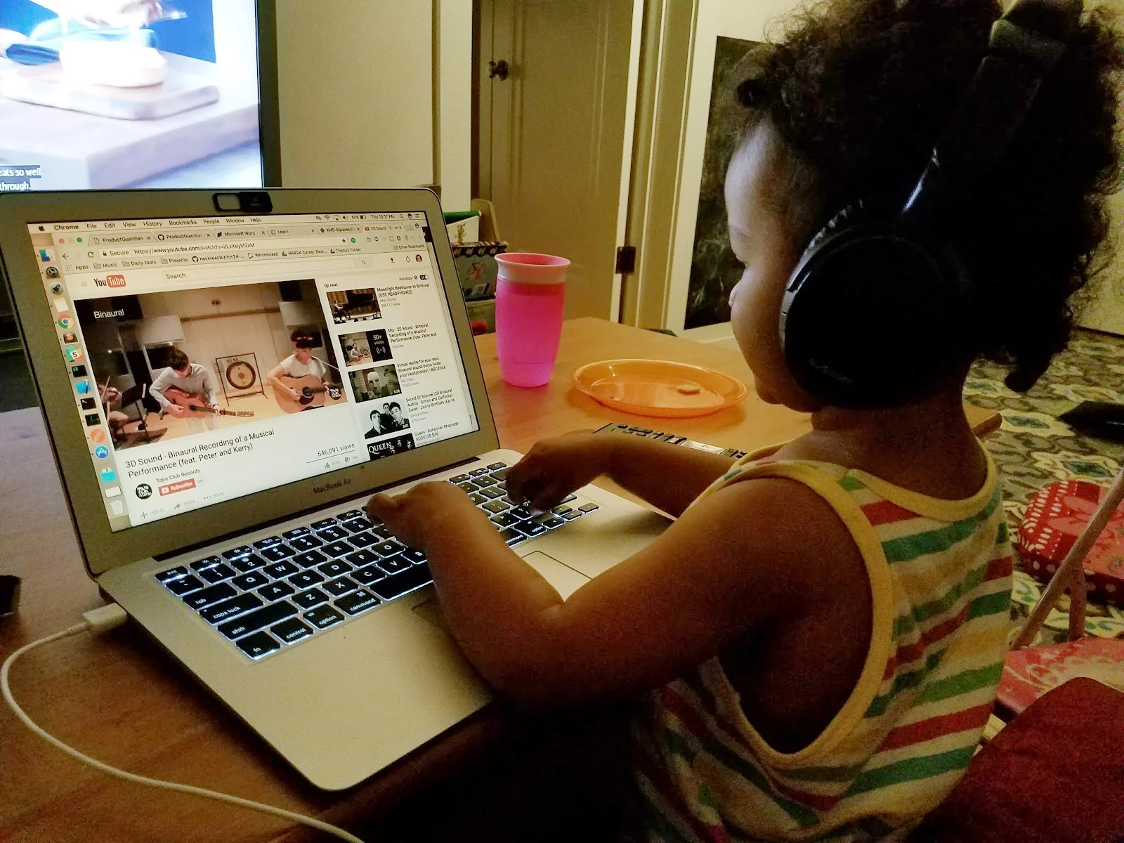 Sheena's daughter enjoys some computer time.