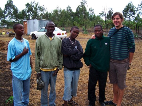  The first boys to live on the land, including Justin and Patrick with friend and long time supporter Ben Carroll. 