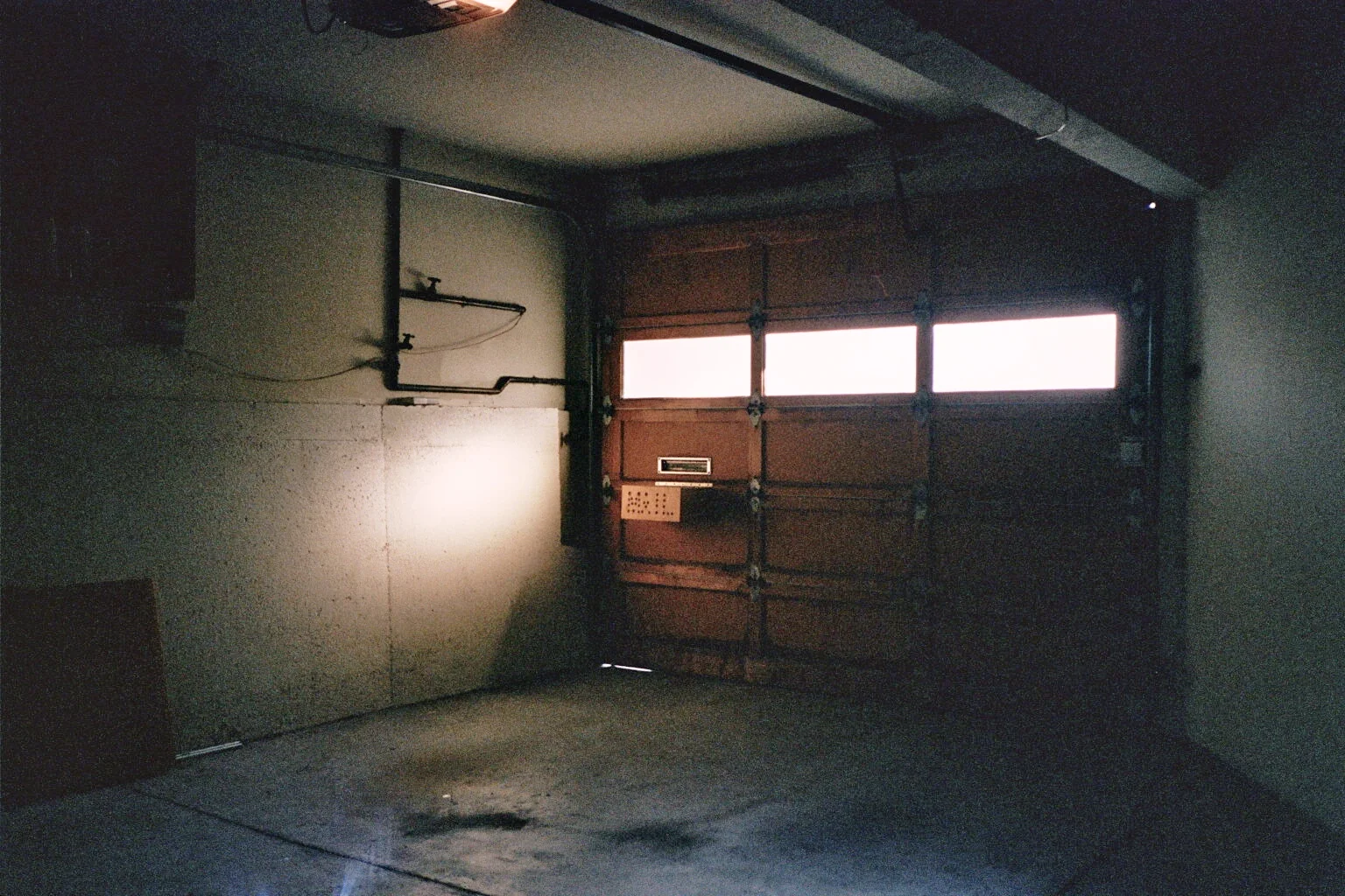 I could never figure out why our garage door was so loud. I swear I've encountered quieter ones. Then again, I'm guessing my parents preferred it that way because the noise could always let them know if someone was home or not.