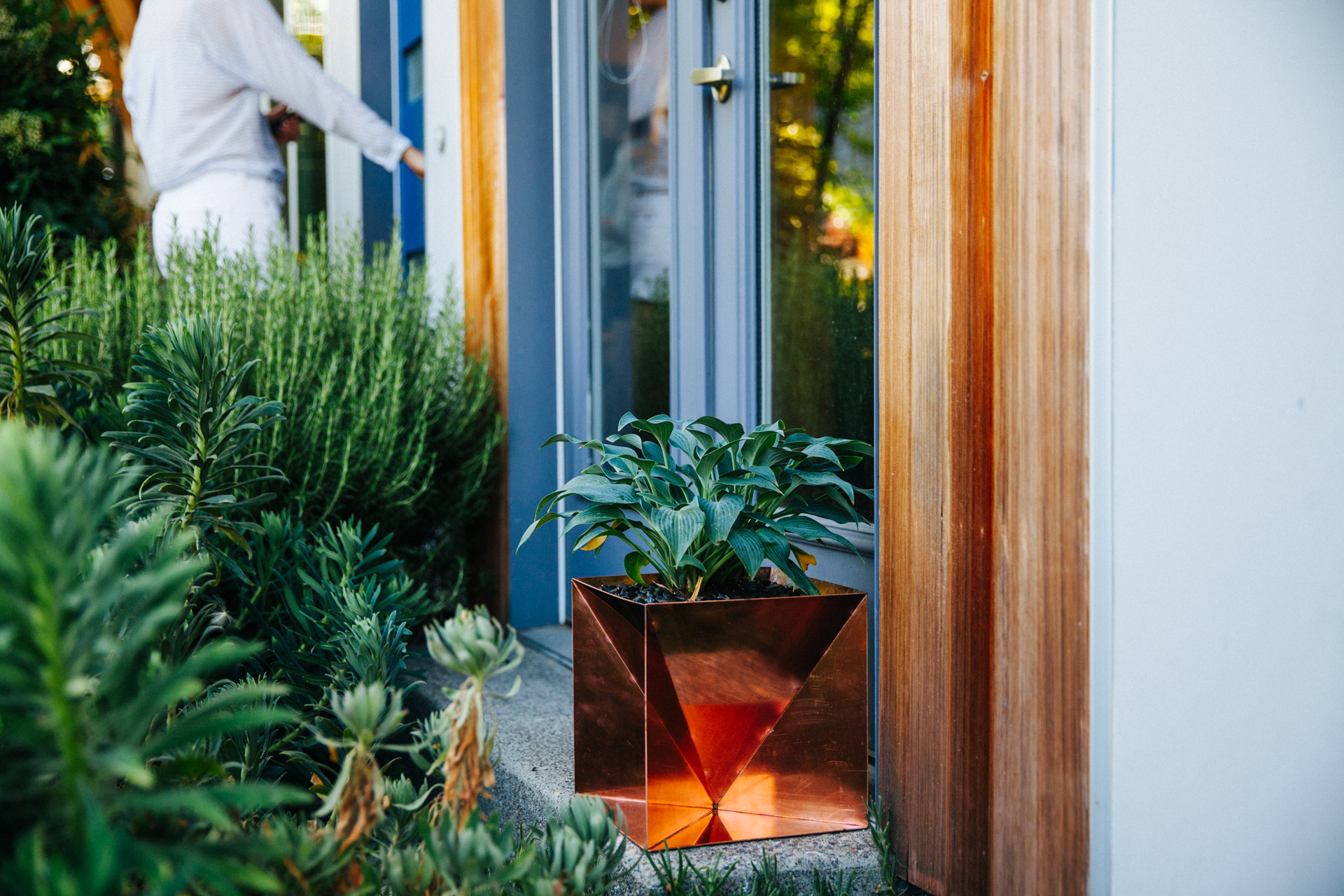 The Copper Origami Planter is an outdoor planter by Trey Jones Studio