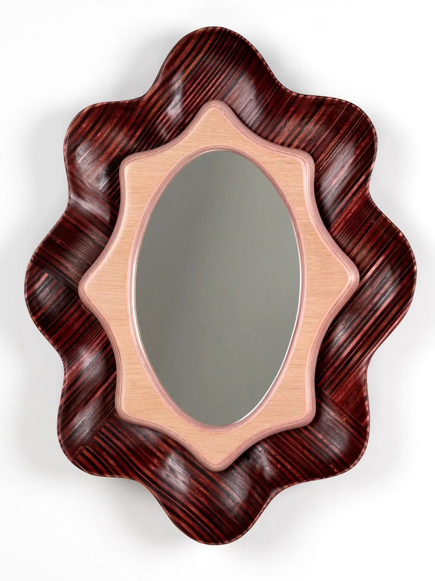 Scallop Mirror in merlot and pink Nerikomi wood, 2026

Inspired by the innately human desire to collect and by what we do with our collections. 

Debuted at @smithsoniancraftshowsswc and awaiting delivery at its super awesome forever home with @sdk_a