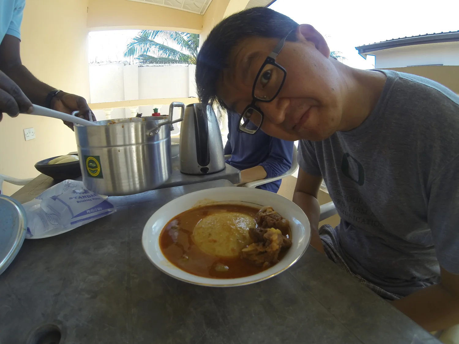 Ready to dig into Wisdom's fufu with pepper soup. The soup had goat, beef and fish along with some pepper, ginger, onion, tomato and some other secret ingredients.