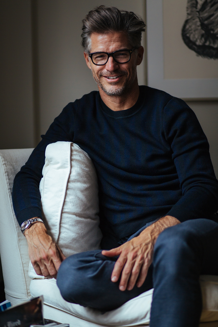Sweater by Sandro, Pants by J Crew, Watch by Rolex, Glasses by Tom Ford.