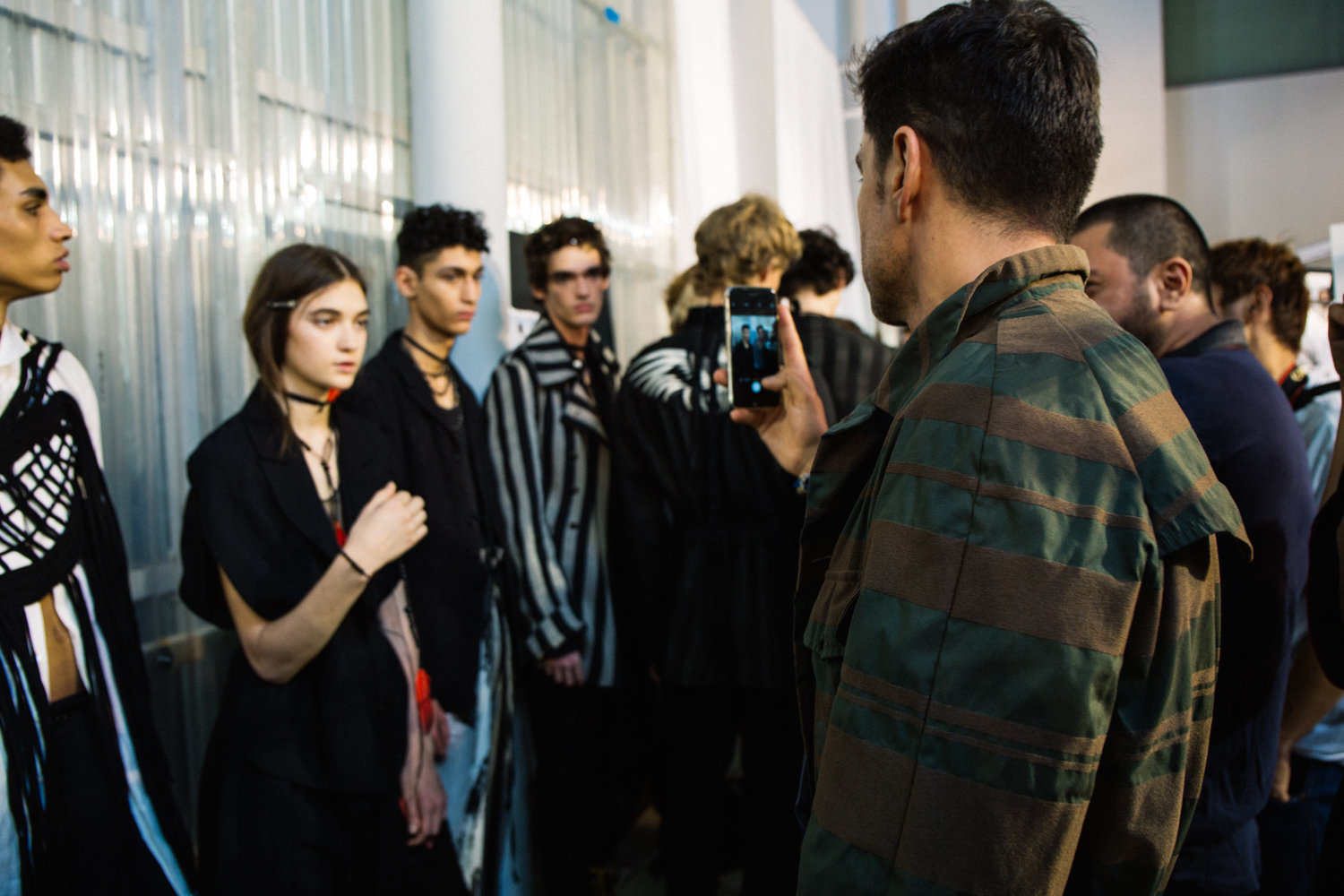 Some backstage action allows Alex to get a closer look at the collection.