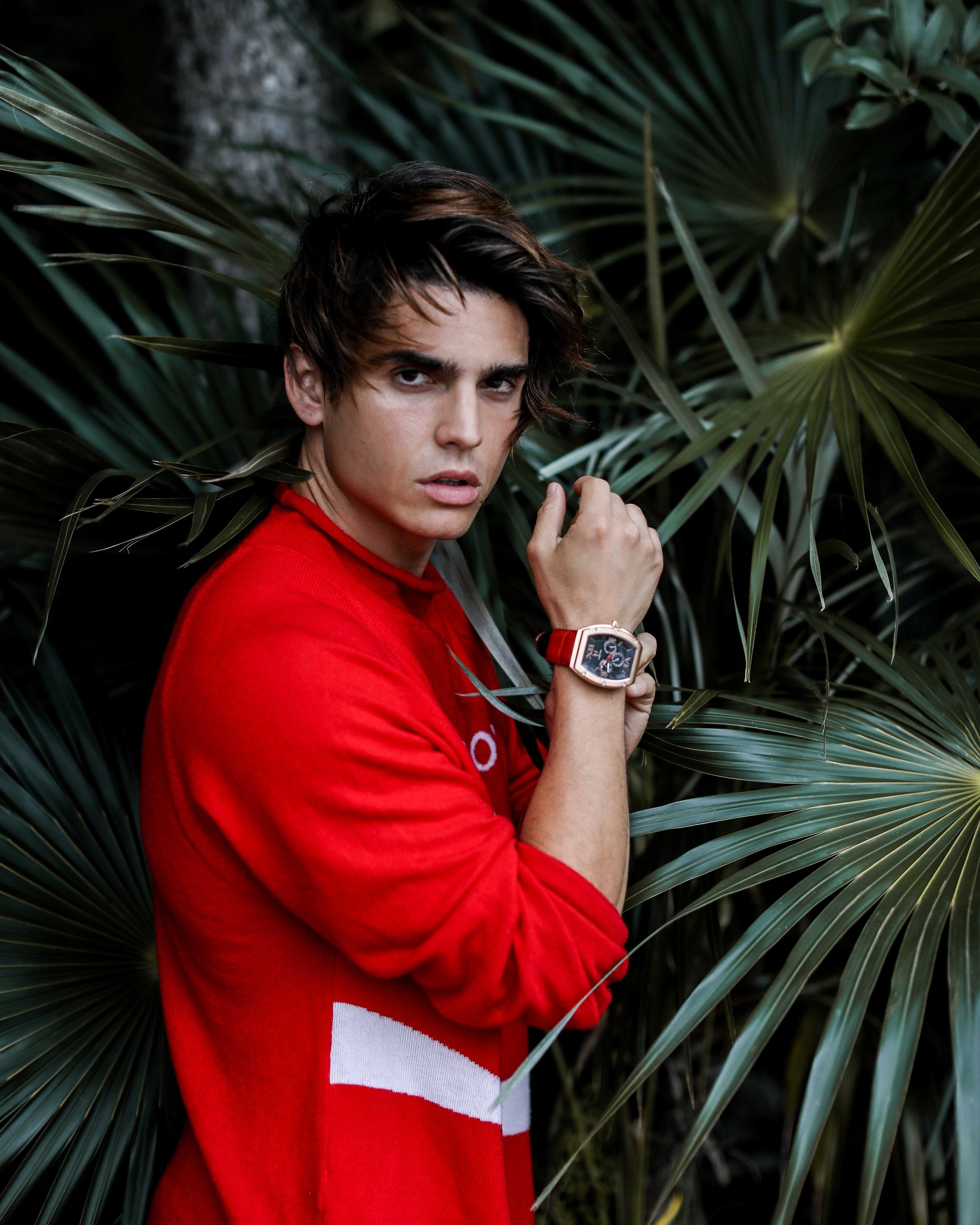 Troy Pes giving us tropical chicness sporting the red limited edition Major from MSTR Watches and a top from Jeremy Scott. 