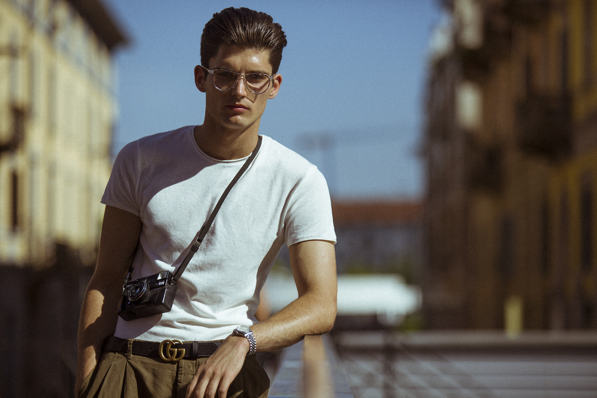 Top by COS, Belt by Gucci, Pants by Zara, Watch by Rolex, Glasses by Warby Parker.