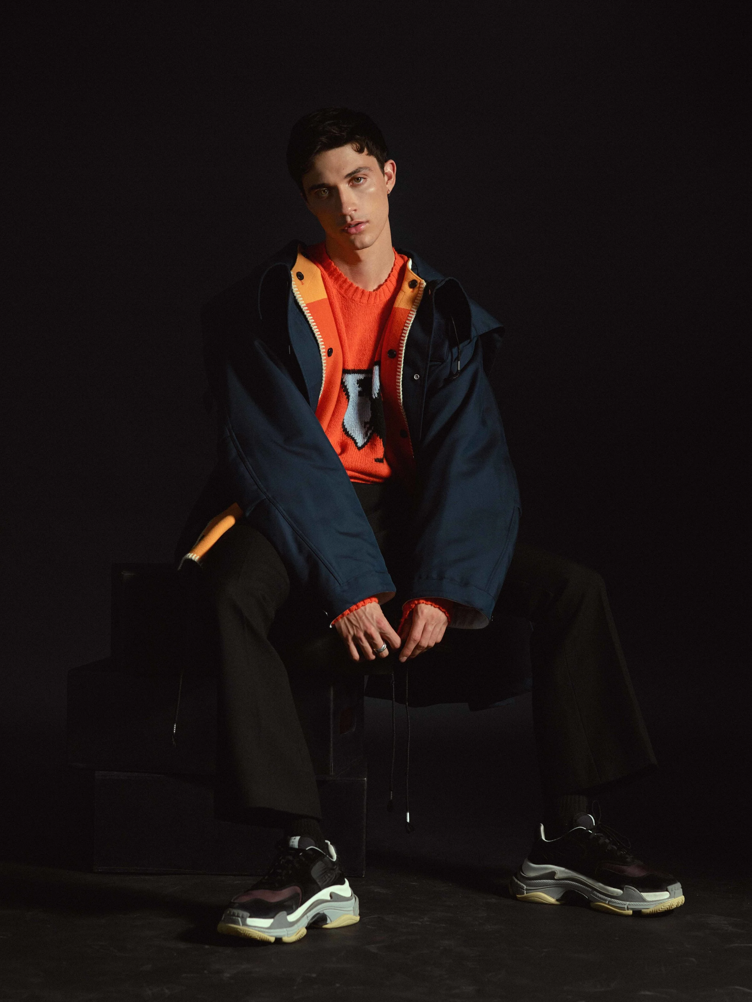 Calvin Klein 205W39NYC parka (fwrd.com), Prada sweater, Alexander Mcqueen pants, Balenciaga shoes